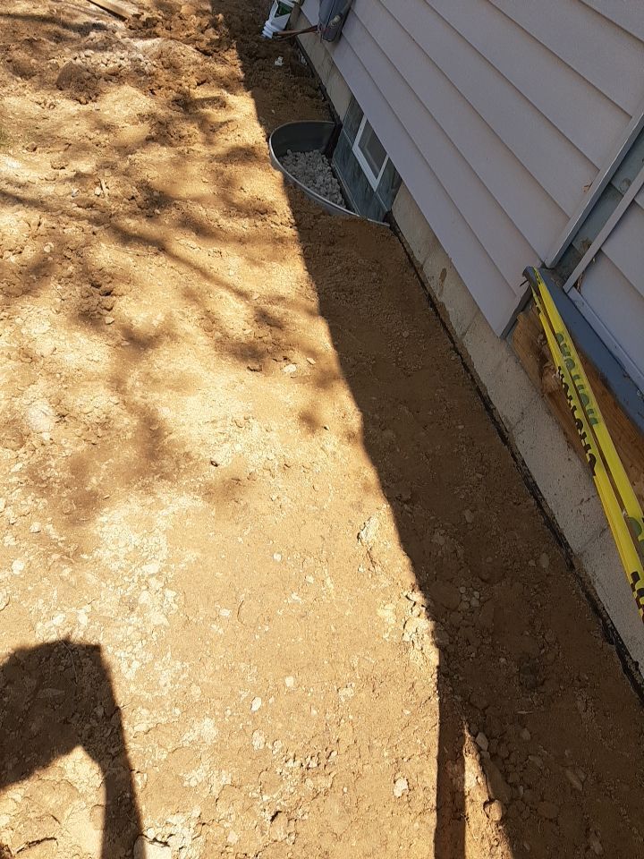 Wall Straightening and Reinforcement using Embedded Fiber Reinforcement by Toledo Basement Repair 