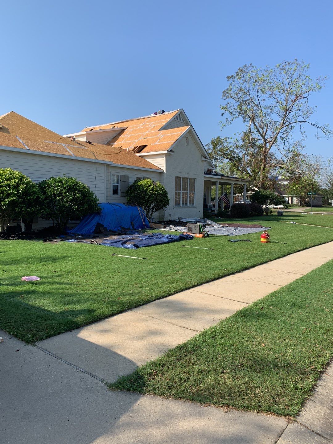 Residential Roofing Installation using Roof Replacement by American Roofing & Construction LLC