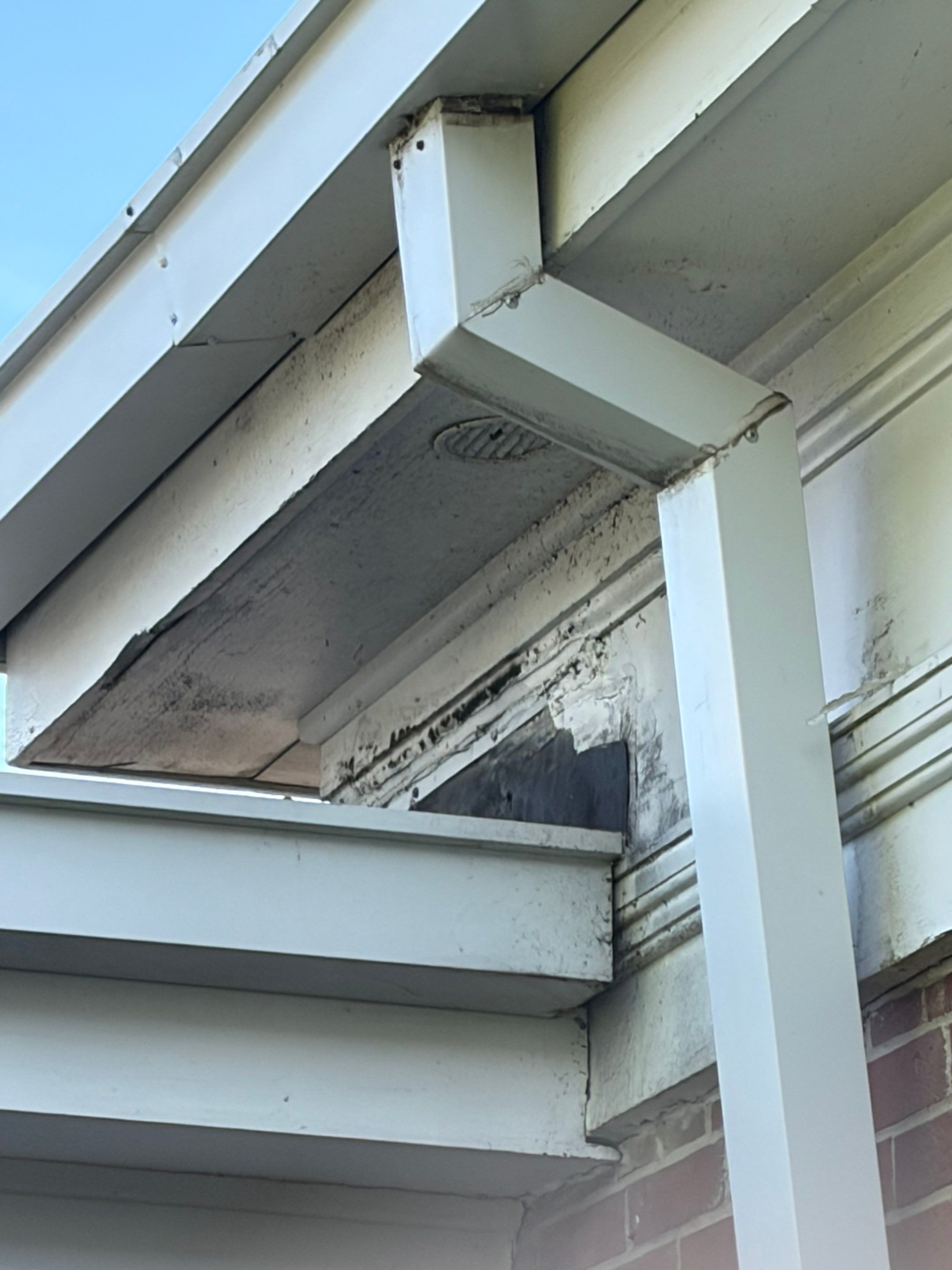 Commercial Wood Trim Restoration and Gutter Replacement in Birmingham by Top Shelf Painter