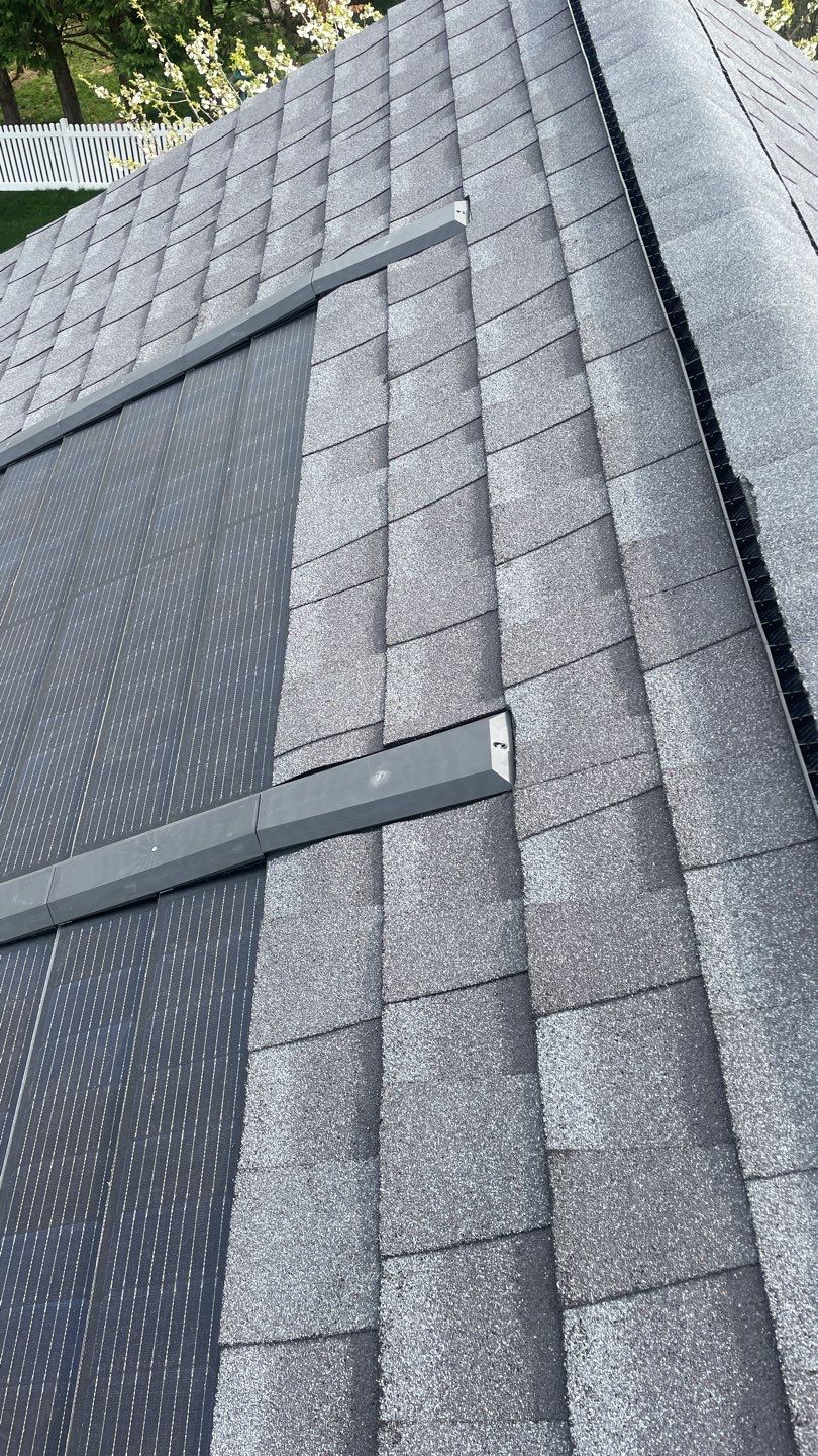 Solar Roof Replacement using GAF Timberline Solar Shingles by American Home Contractors