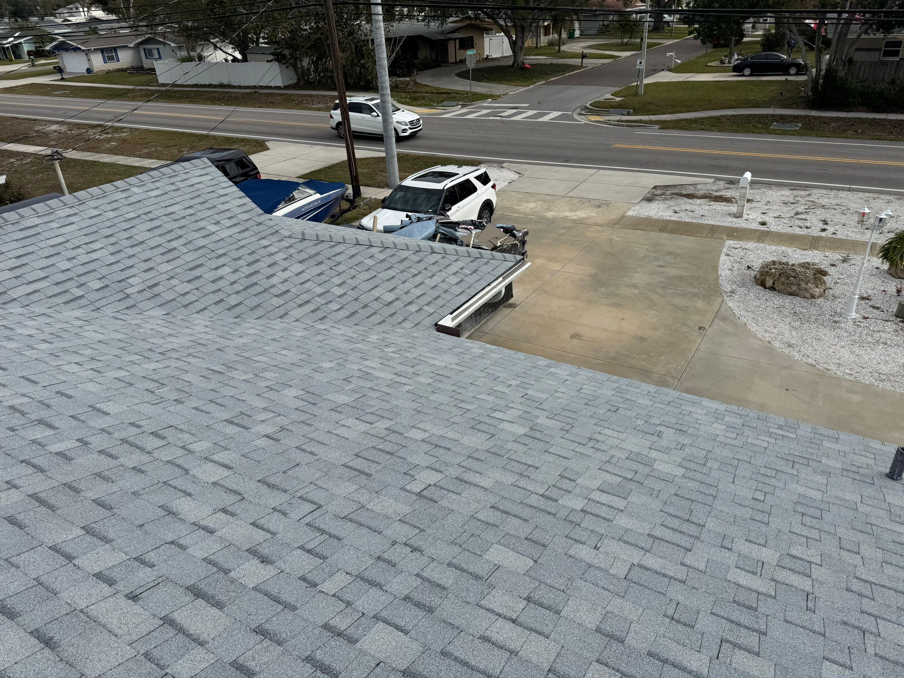 Estate Gray Shingles by Reimagine Roofing