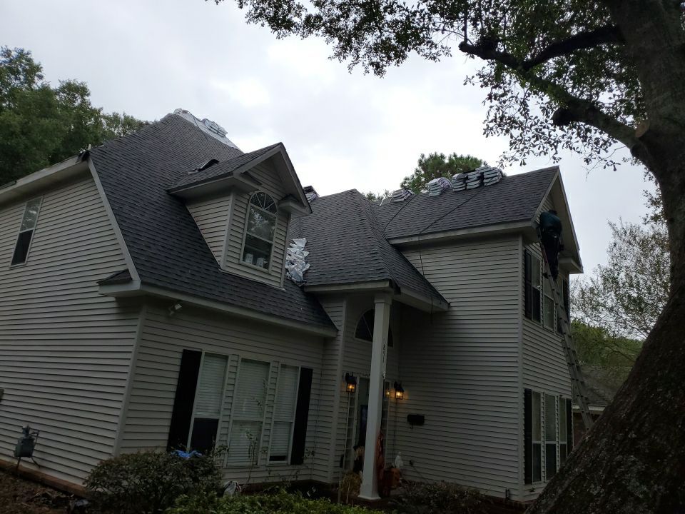Residential Roofing Installation using Roof Replacement by American Roofing & Construction LLC