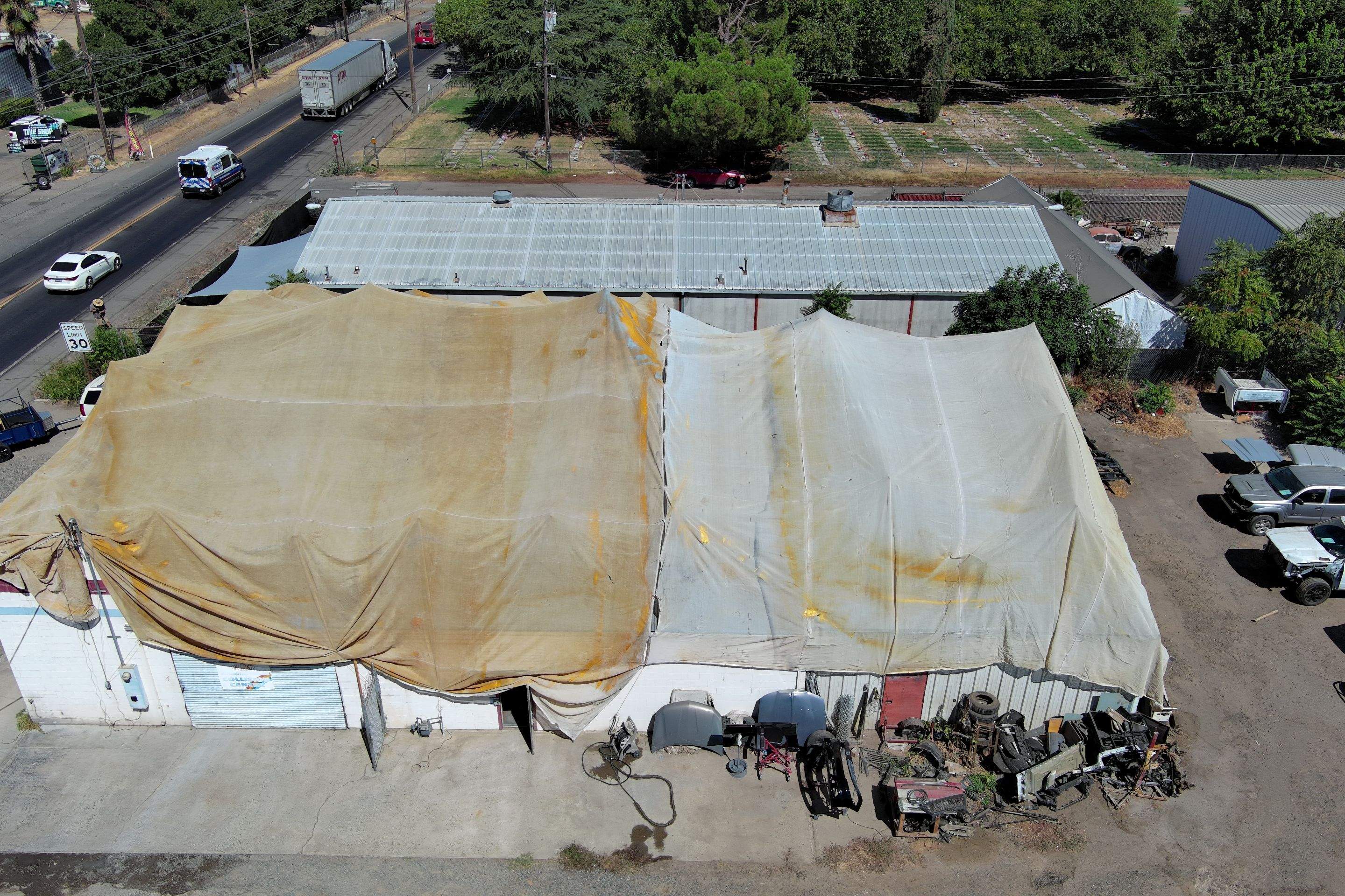 Spray foam and coatings using Conklin Benchmark/ PUMA XL acrylic coatings over metal and foam by Straight Edge Roofing Inc