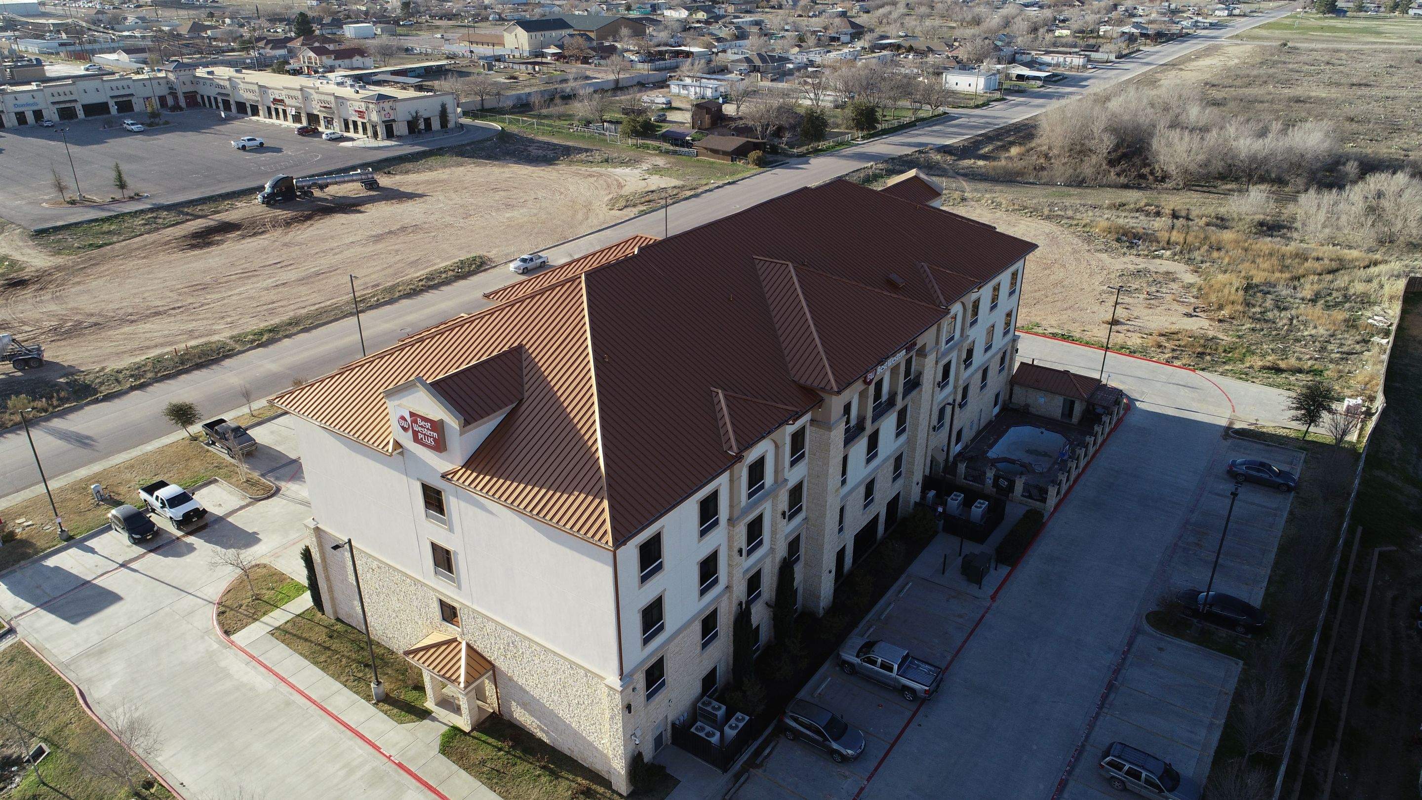 Commercial Roof Replacement for Best Western using Standing Seam Roofing - Midland, TX by Roof Experts