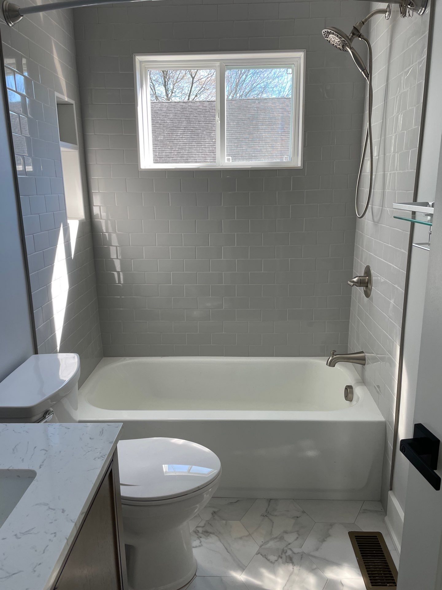 New Construction Bathrooms and Fireplace by Footprints Floors of East Atlanta