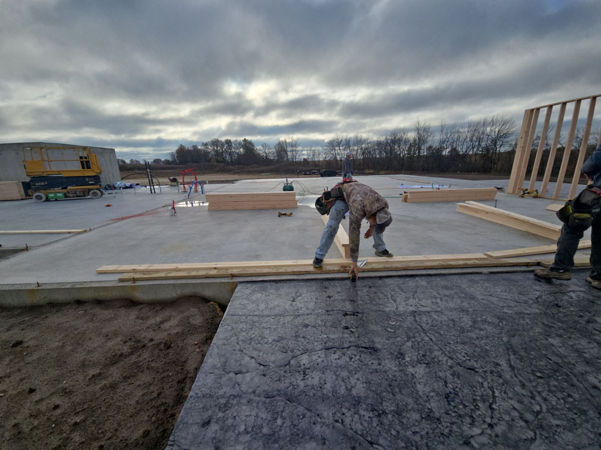 New Home construction w/ board and batten sides and metal roof  by Miles Construction 