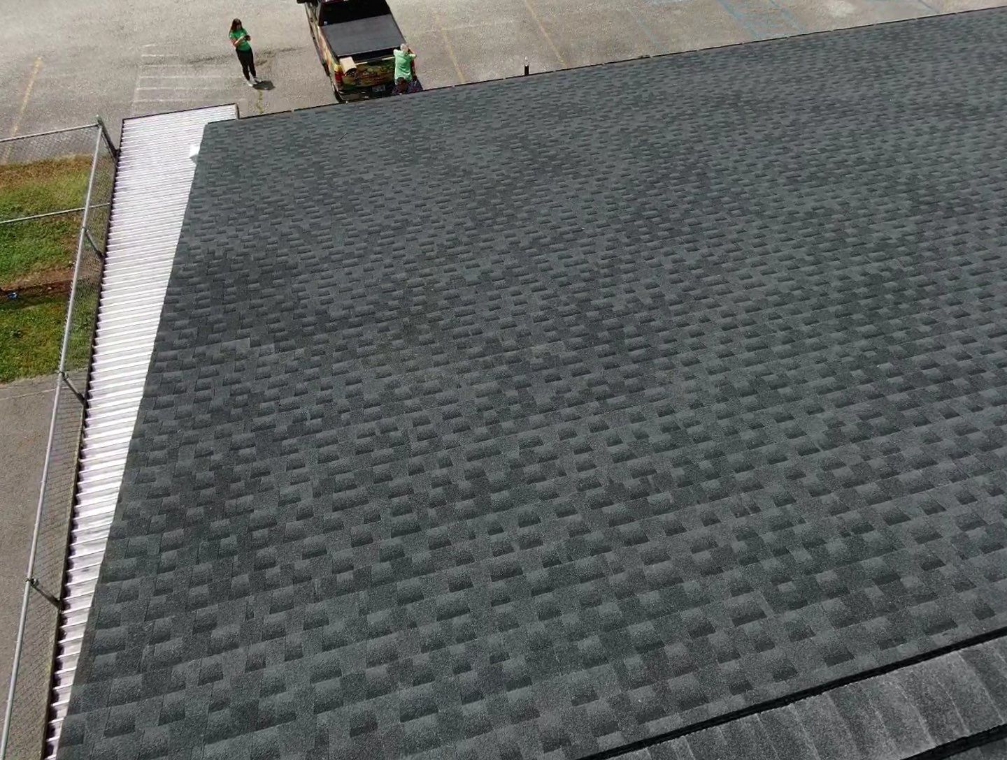 Commercial Roofing Installation using Performance Shingles by Mr. Roofer