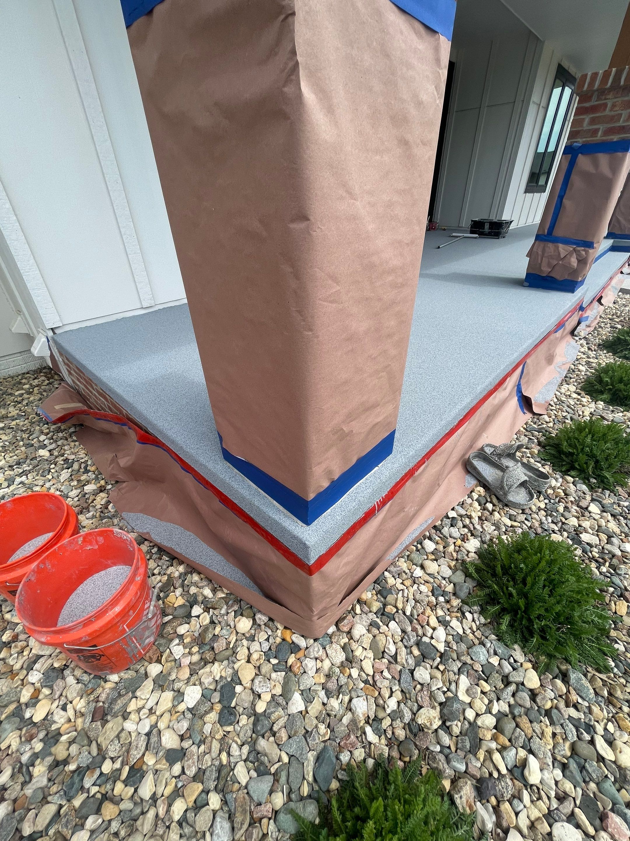 Grey Speckled Concrete Porch Coating for Sioux Falls Home by Select Painting, Coatings & Garage Cabinets