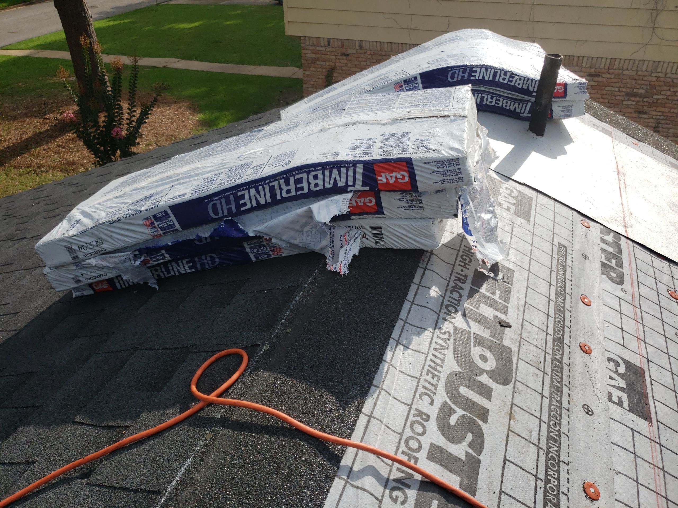 Residential Roofing Installation using Roof Replacement by American Roofing & Construction LLC