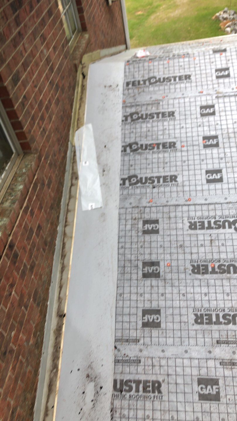 Residential Roofing Installation using Roof Replacement by American Roofing & Construction LLC