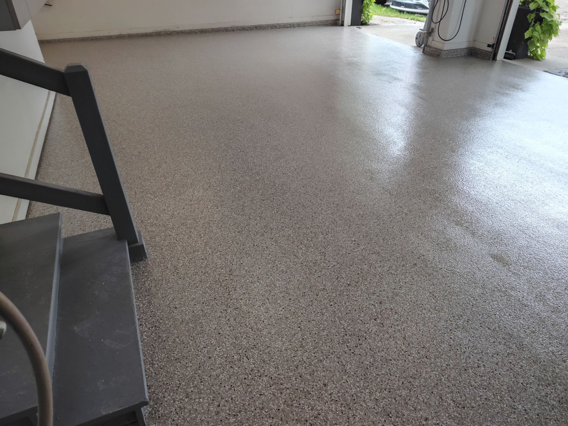 Residential Garage Floor Coating and Concrete Repair in Johnston by Revival Concrete Coatings
