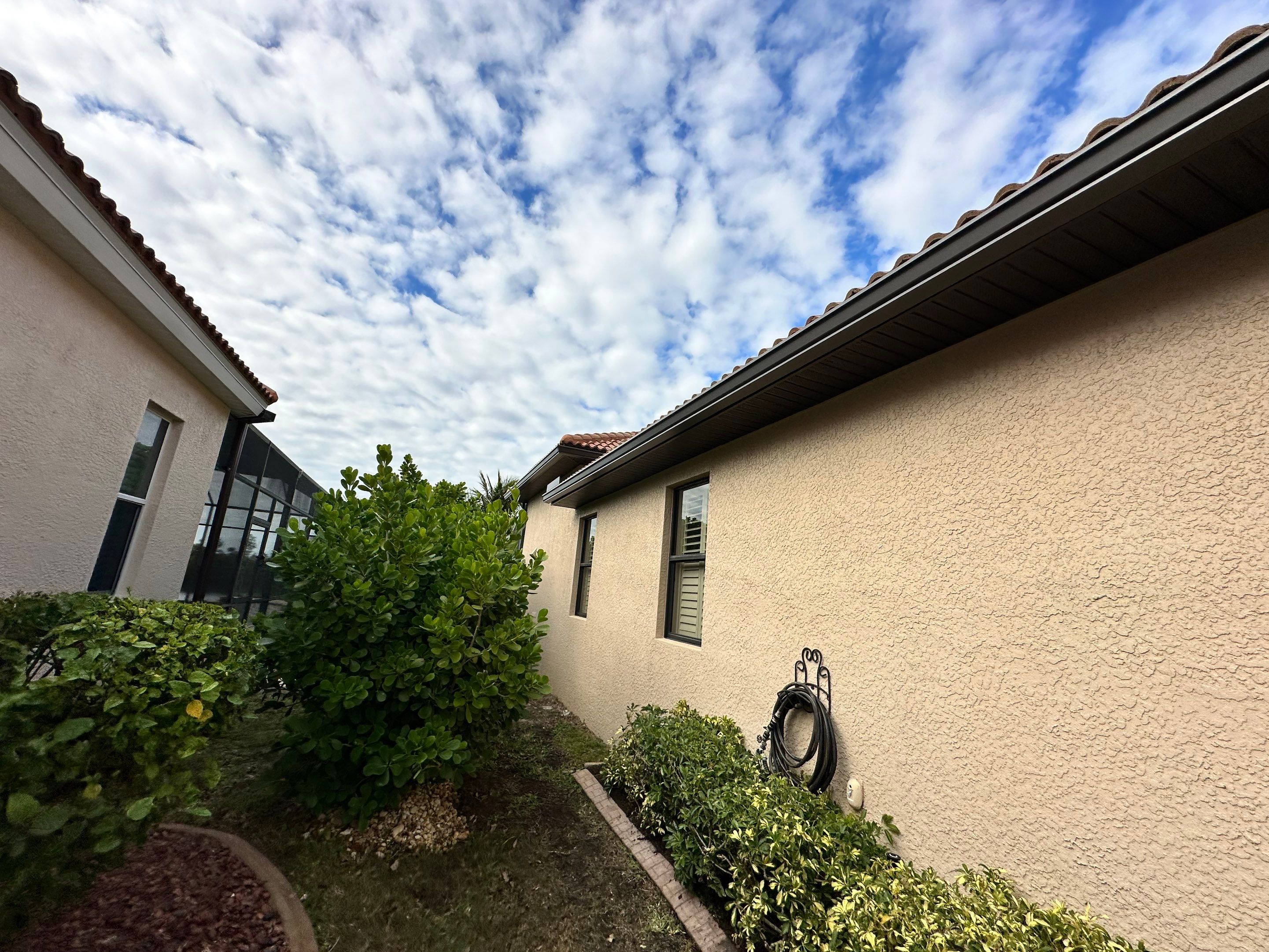 Bronze Downspout Installation in Cape Coral FL by Gutter Professors
