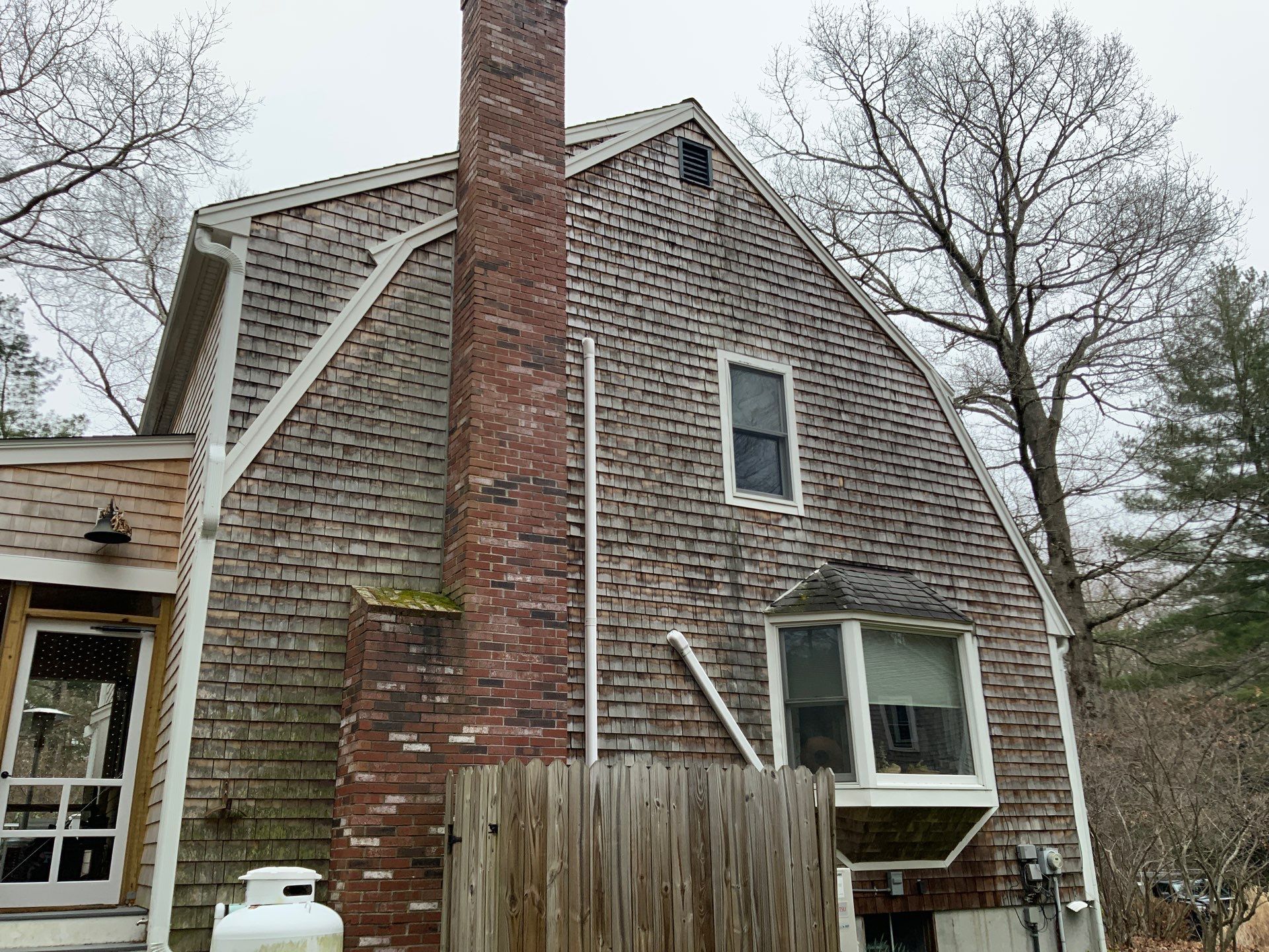 Partial residing project with Red Cedar shingles in Duxbury, MA by UBrothers Construction