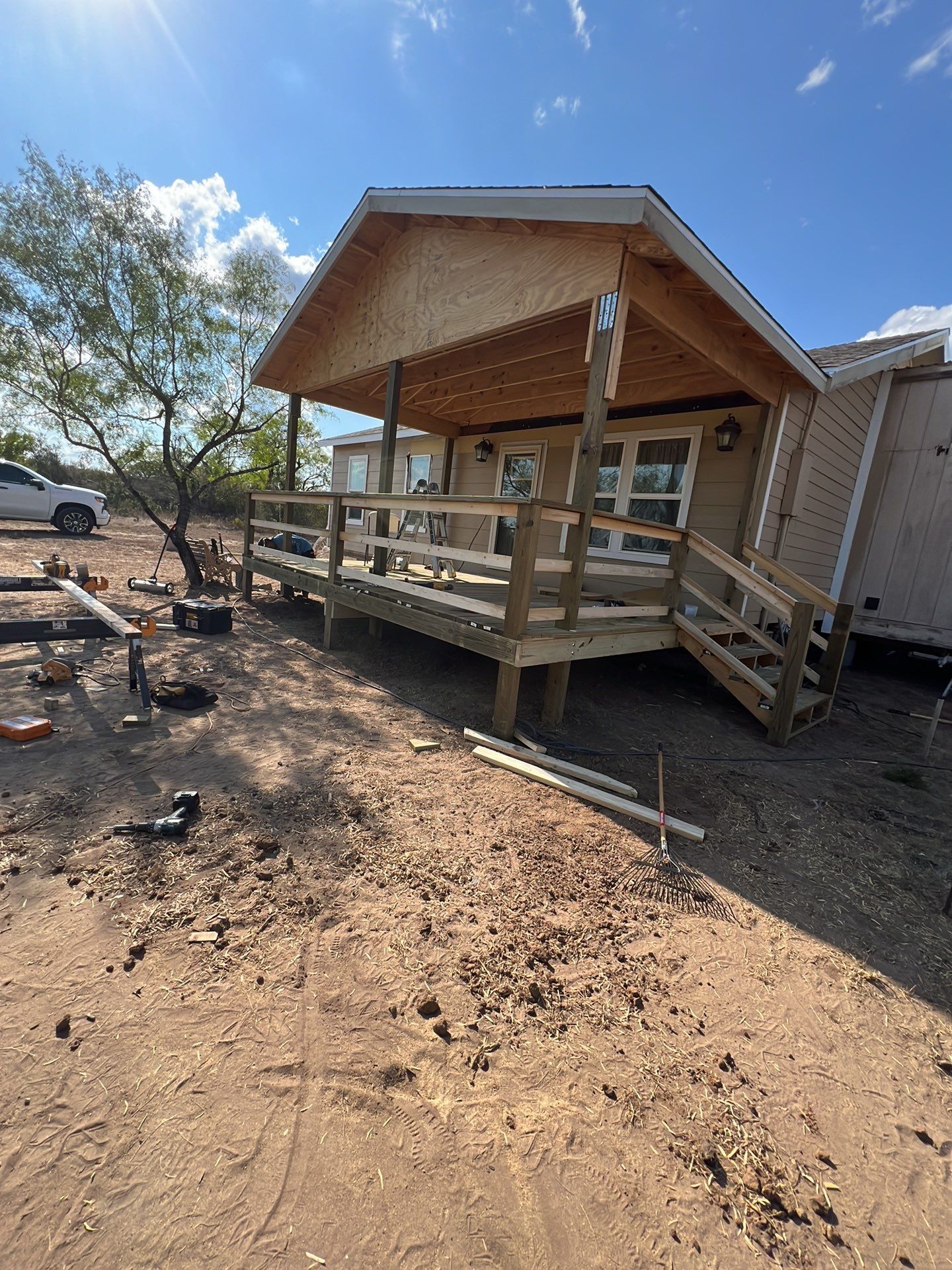 Front Porch Sitt'n by Bayfront Roofing and Construction