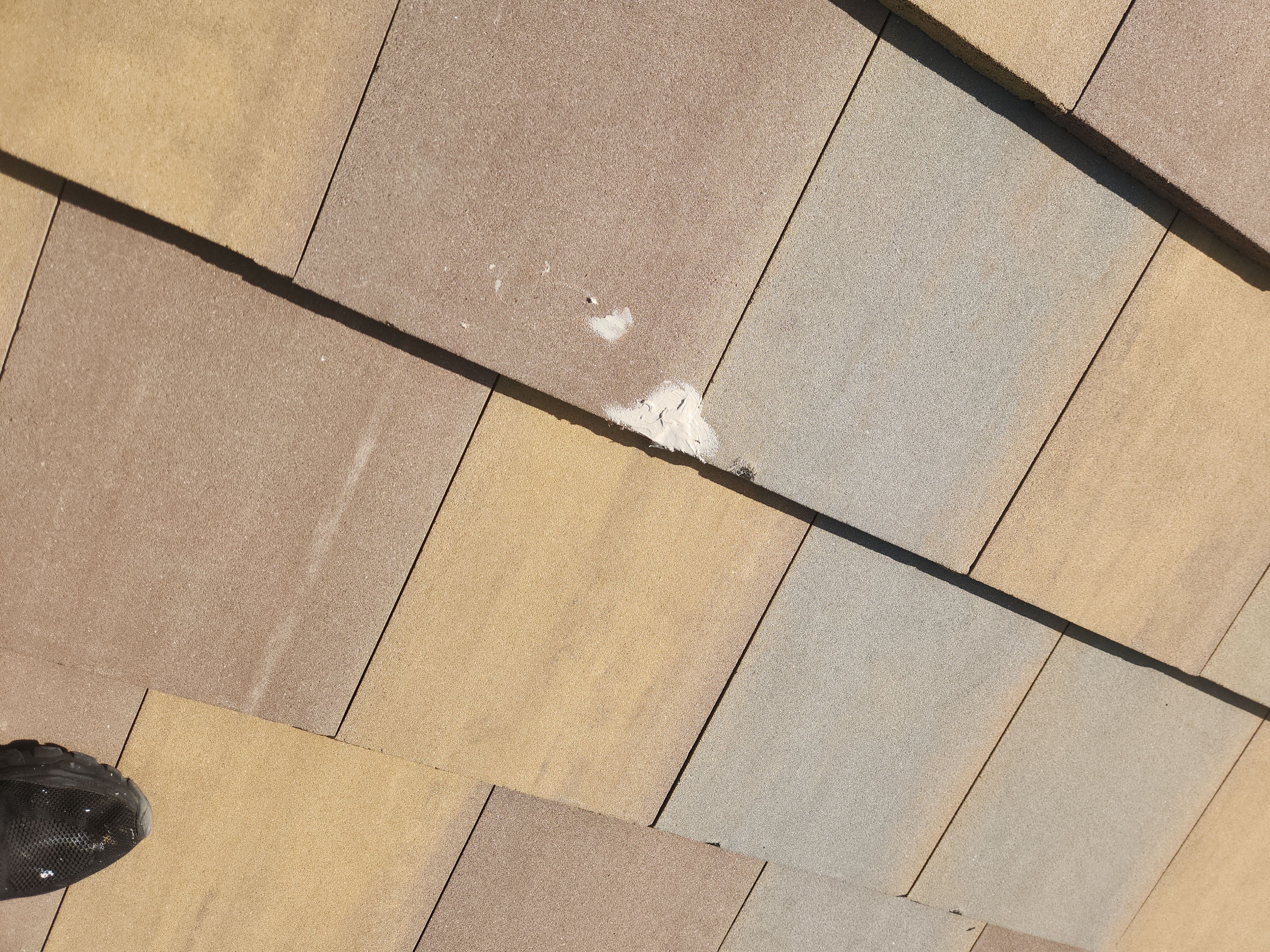 Concrete Tile Roof Repair for Residential Home in Wellington by Aastro Roofing