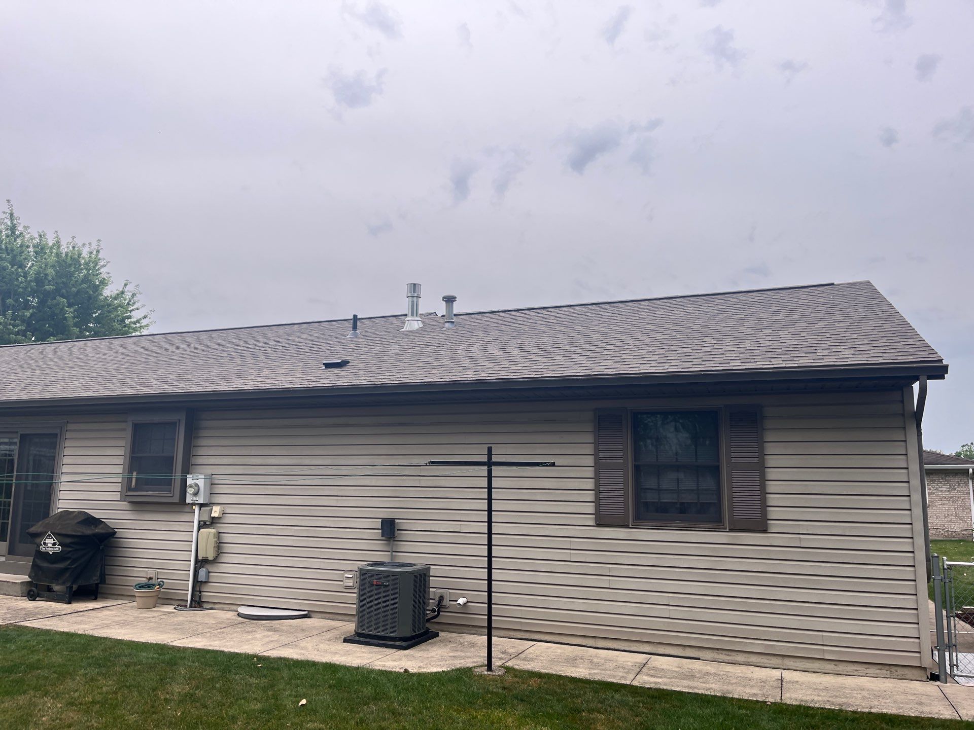 Residential Roofing Installation using GAF Timberline HDZ Weathered Wood by Nitro Roofing and Construction