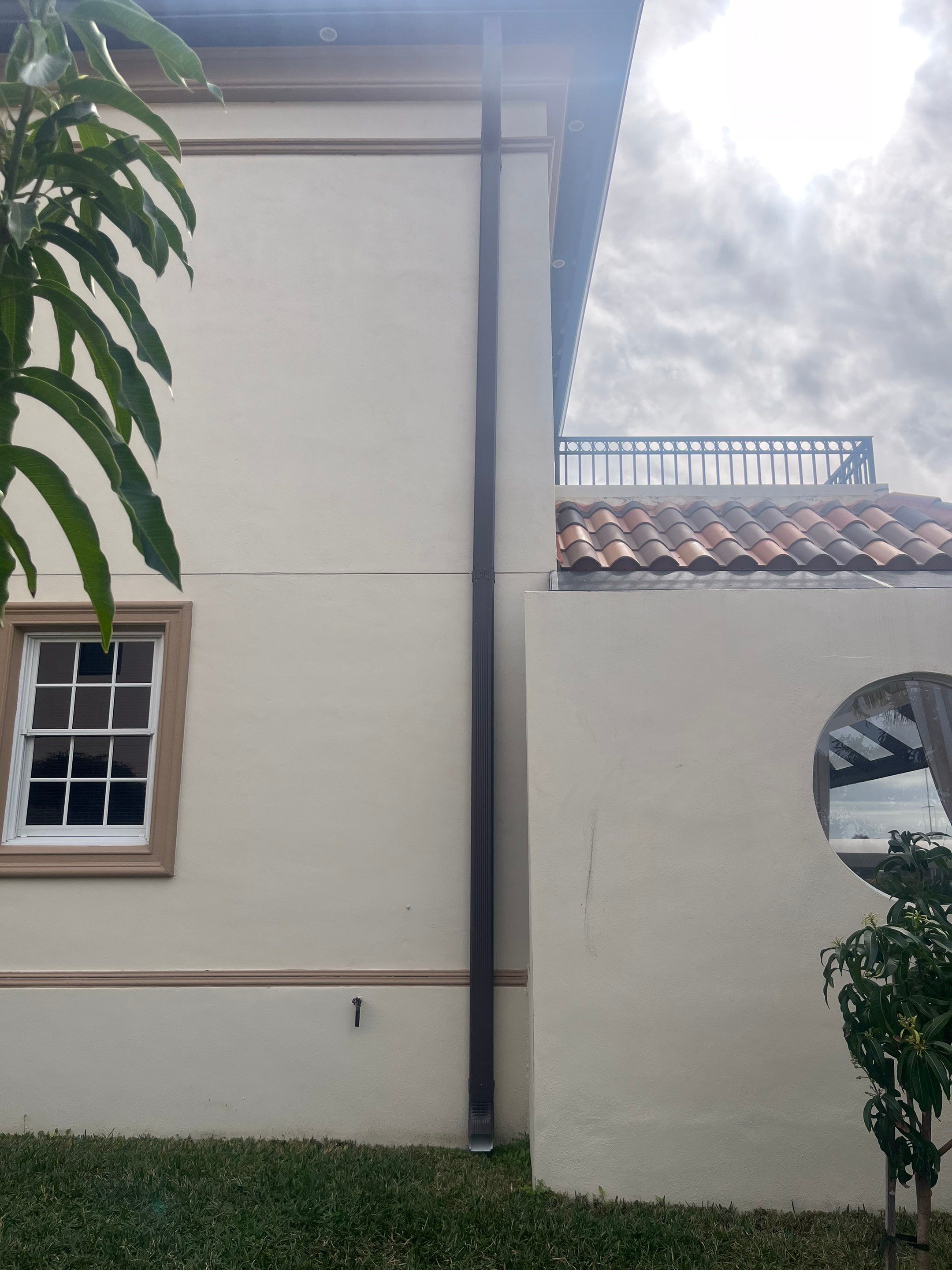 Musket Brown Seamless Gutters using Musket Brown Seamless Gutters in Cape Coral FL by Gutter Professors
