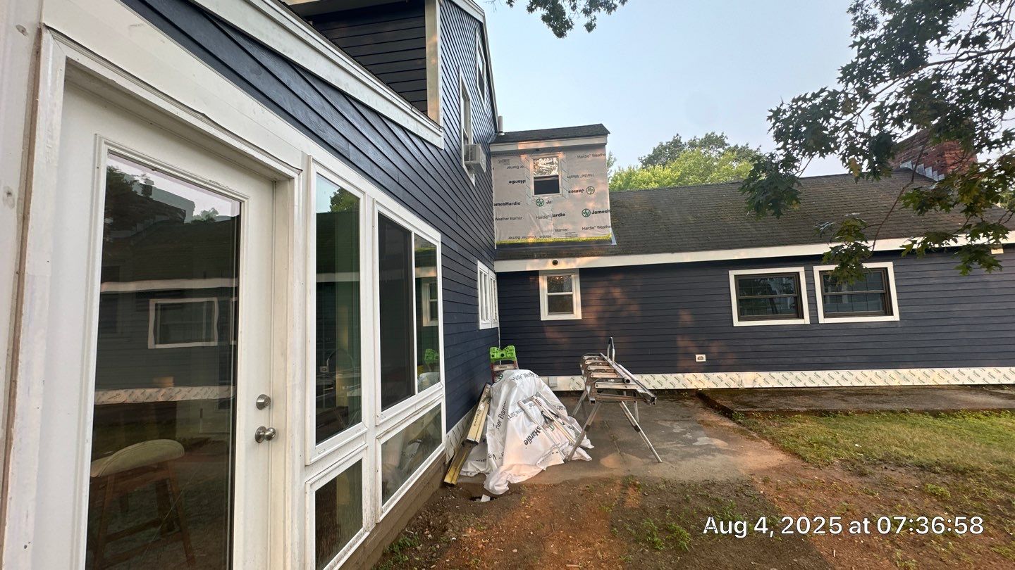 James Hardie Lap Siding Installation in Chelmsford, MA by Mighty Dog Roofing of Greater Middlesex County