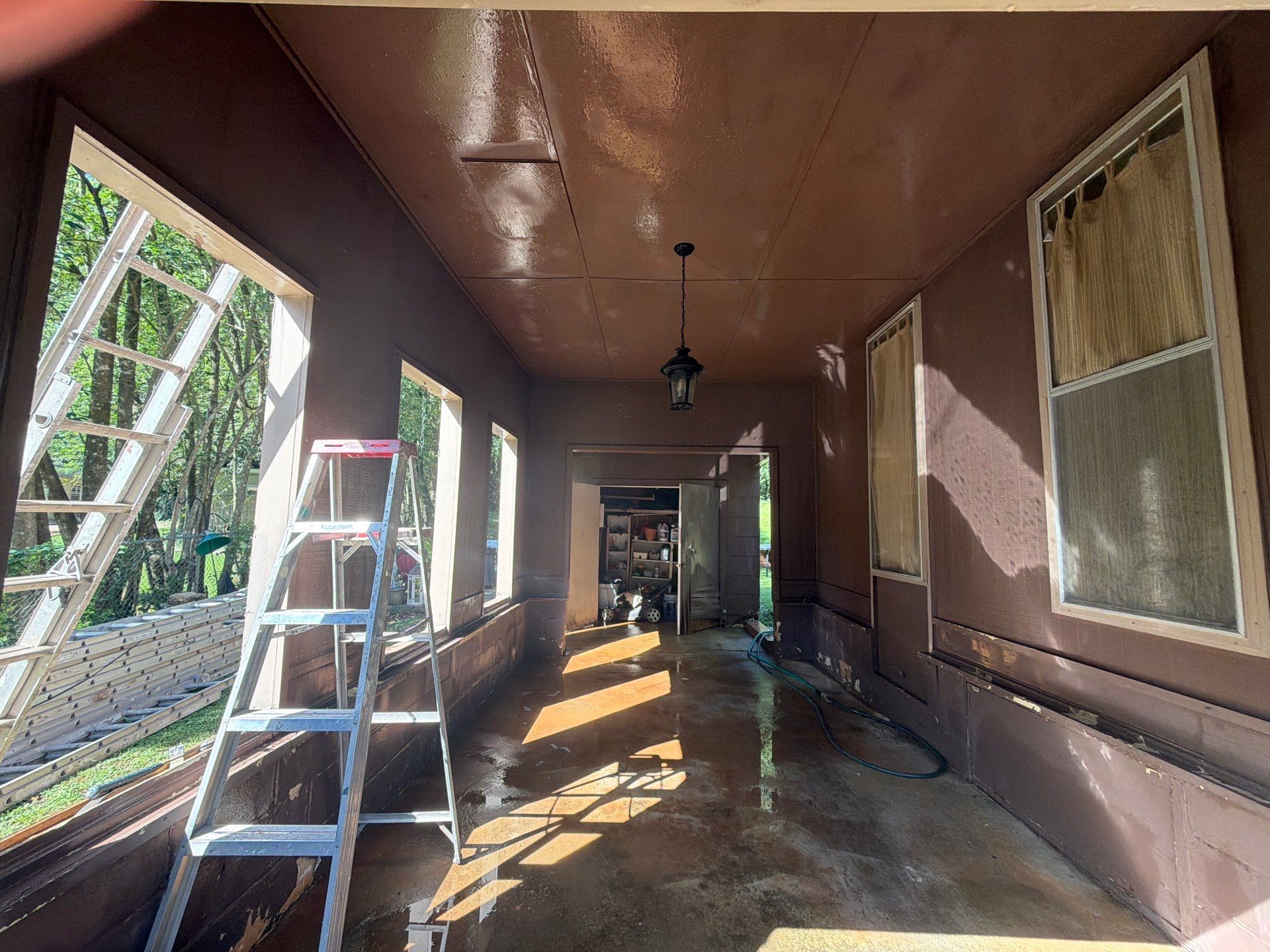 Full Exterior Repaint with Navy Blue and White Trim by Swift Home Renovations
