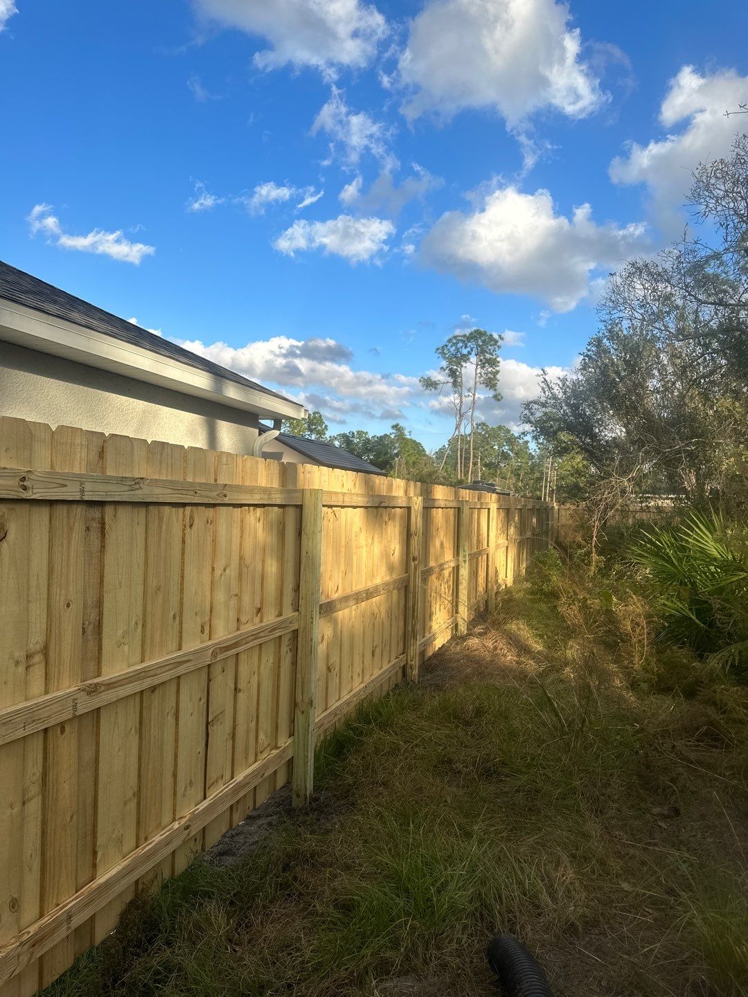 Wood Fence Installation using Vertical Wood Fence by Asap fence and gates, LLC