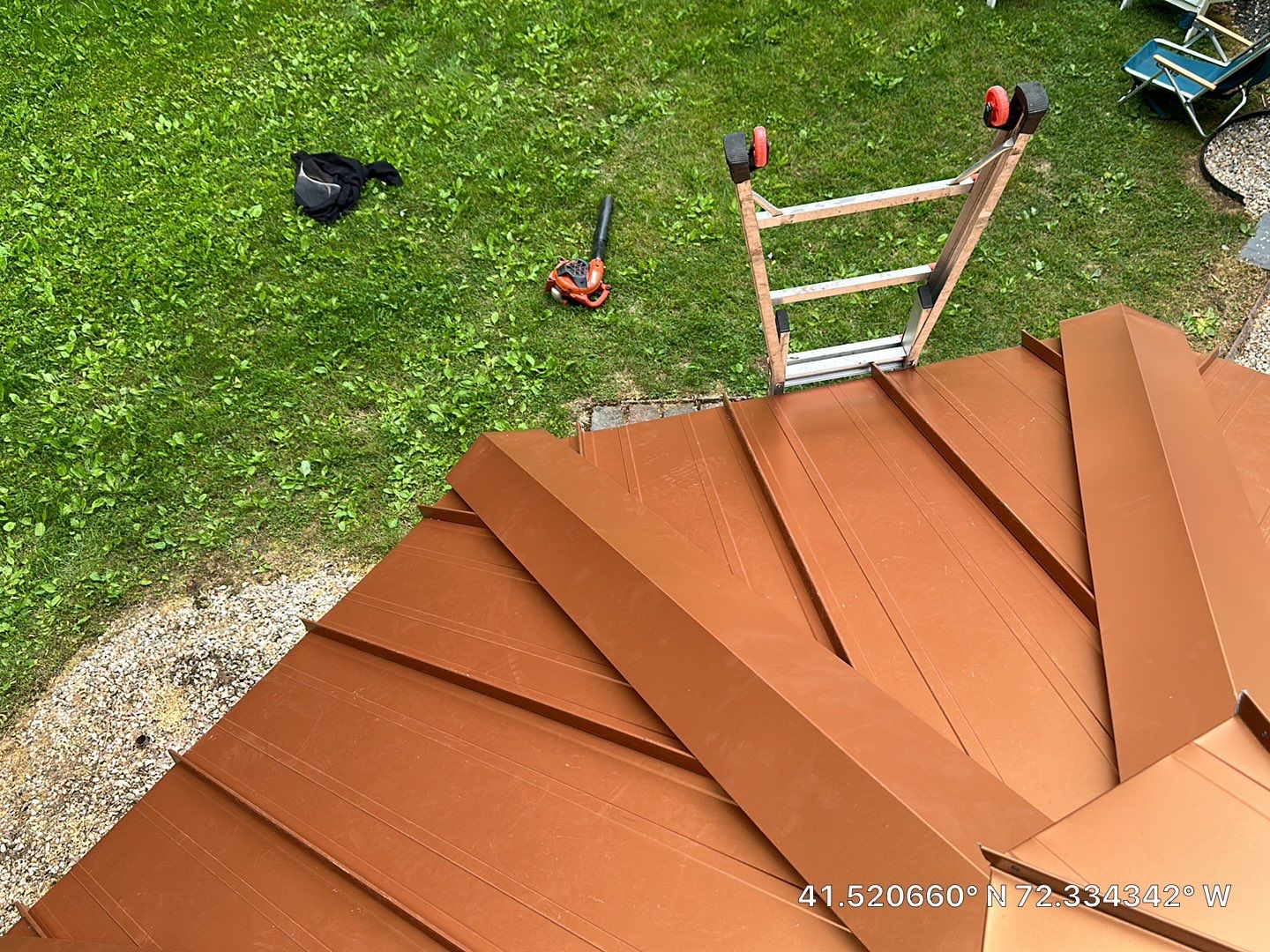 Residential Roofing Installation using Copper Penny Metal Roof by A Plus Exterior