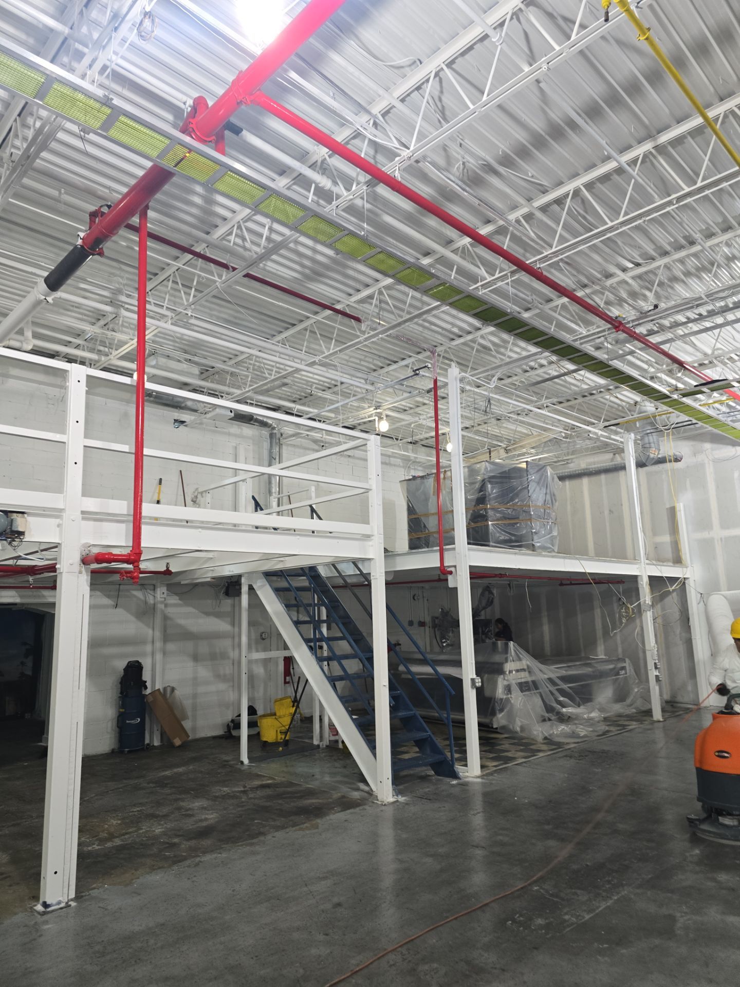 Industrial Warehouse Fire Damage Cleaning and Spray Sealing in Islandia by EMS Restoration Corp
