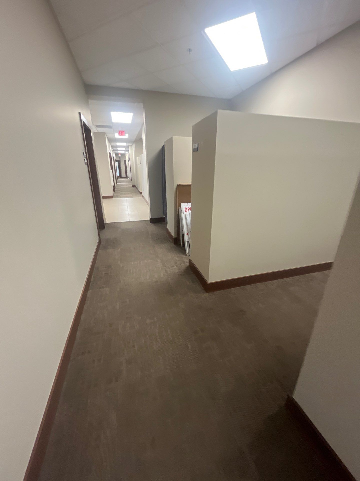 Commercial Office Interior Remodel and Modern Suite Refresh in Sioux Falls by Select Painting, Coatings & Garage Cabinets