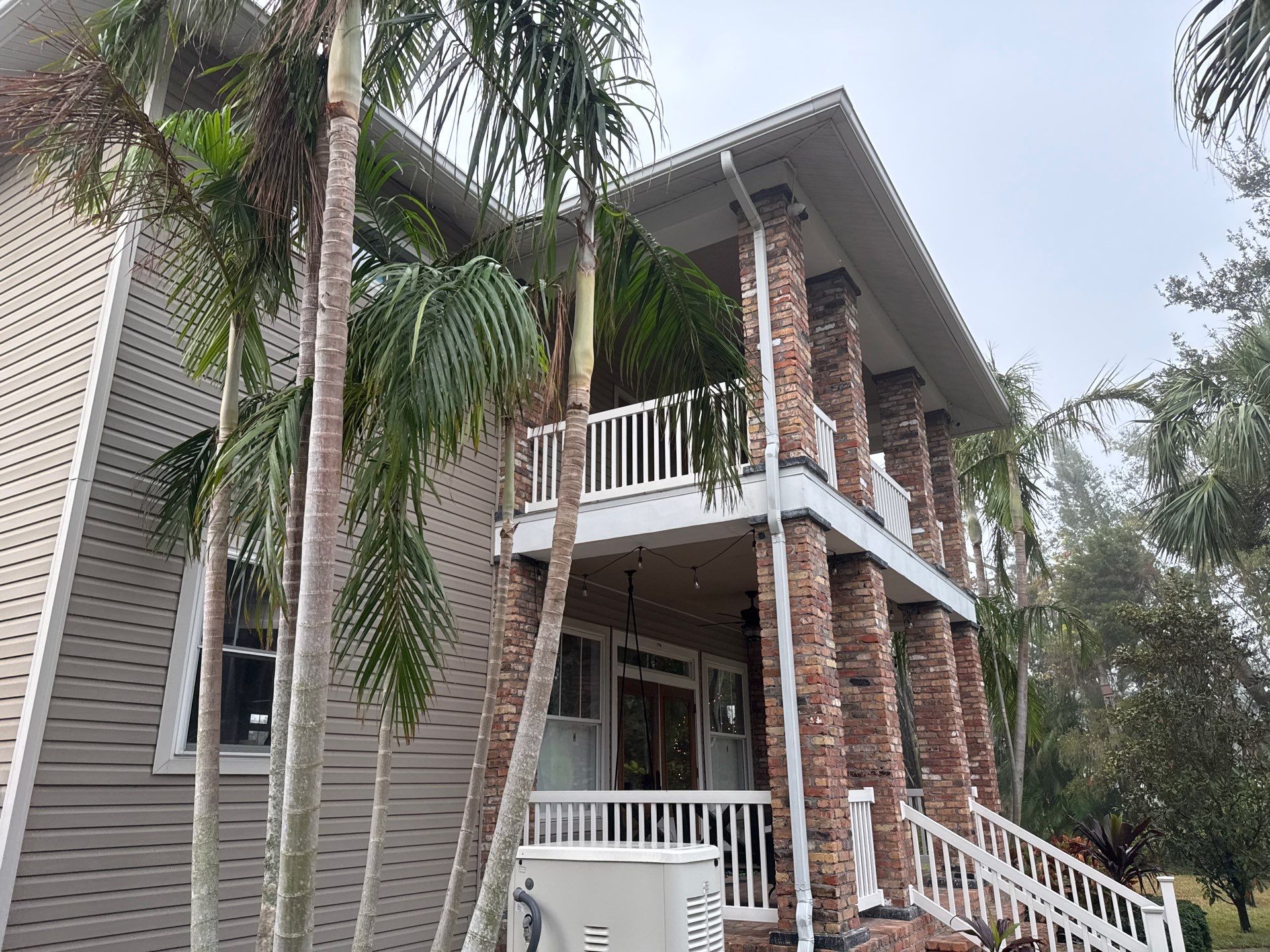 2-Story House Wash and Garage Pressure Washing in Palmetto, FL by Sunshine AquaWash