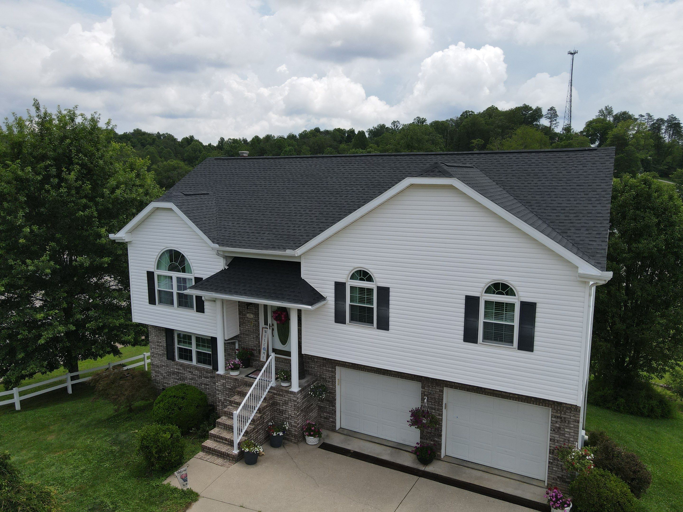 Residential Roofing Installation using GAF Timberline HDZ Charcoal by Rainstoppers Roofing