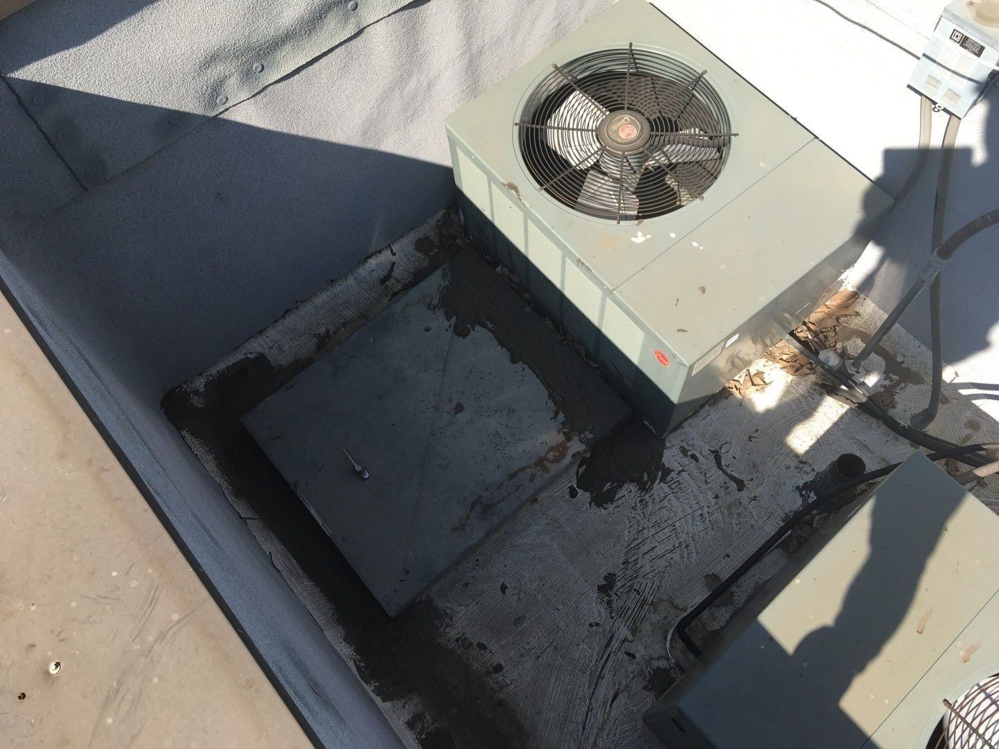 Spray foam and coatings inside commercial building HVAC well using Spray foam and coatings over existing BUR system by Straight Edge Roofing Inc