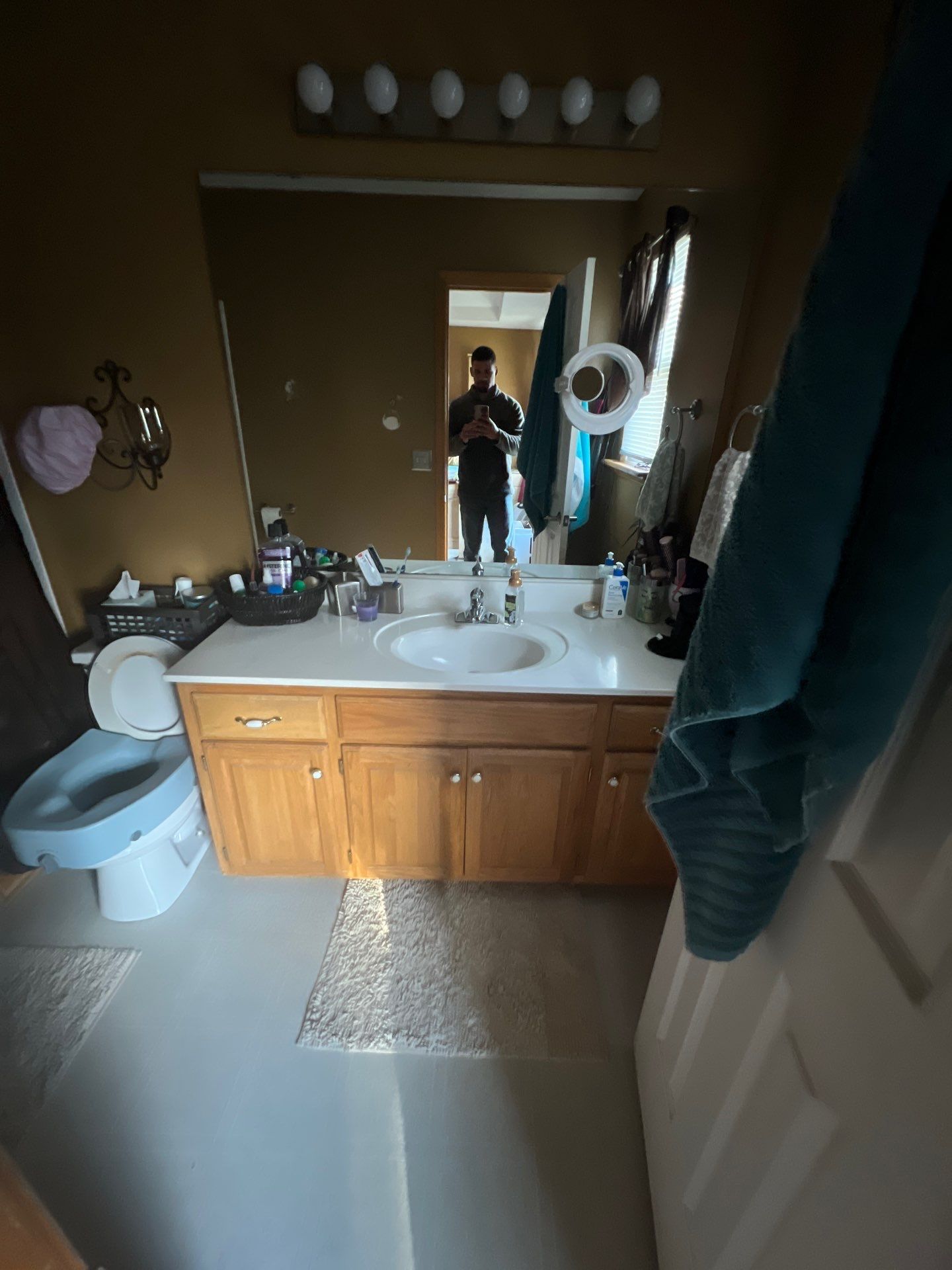 Bathroom Remodel using Luxury Vinyl Plank by The Shower Company