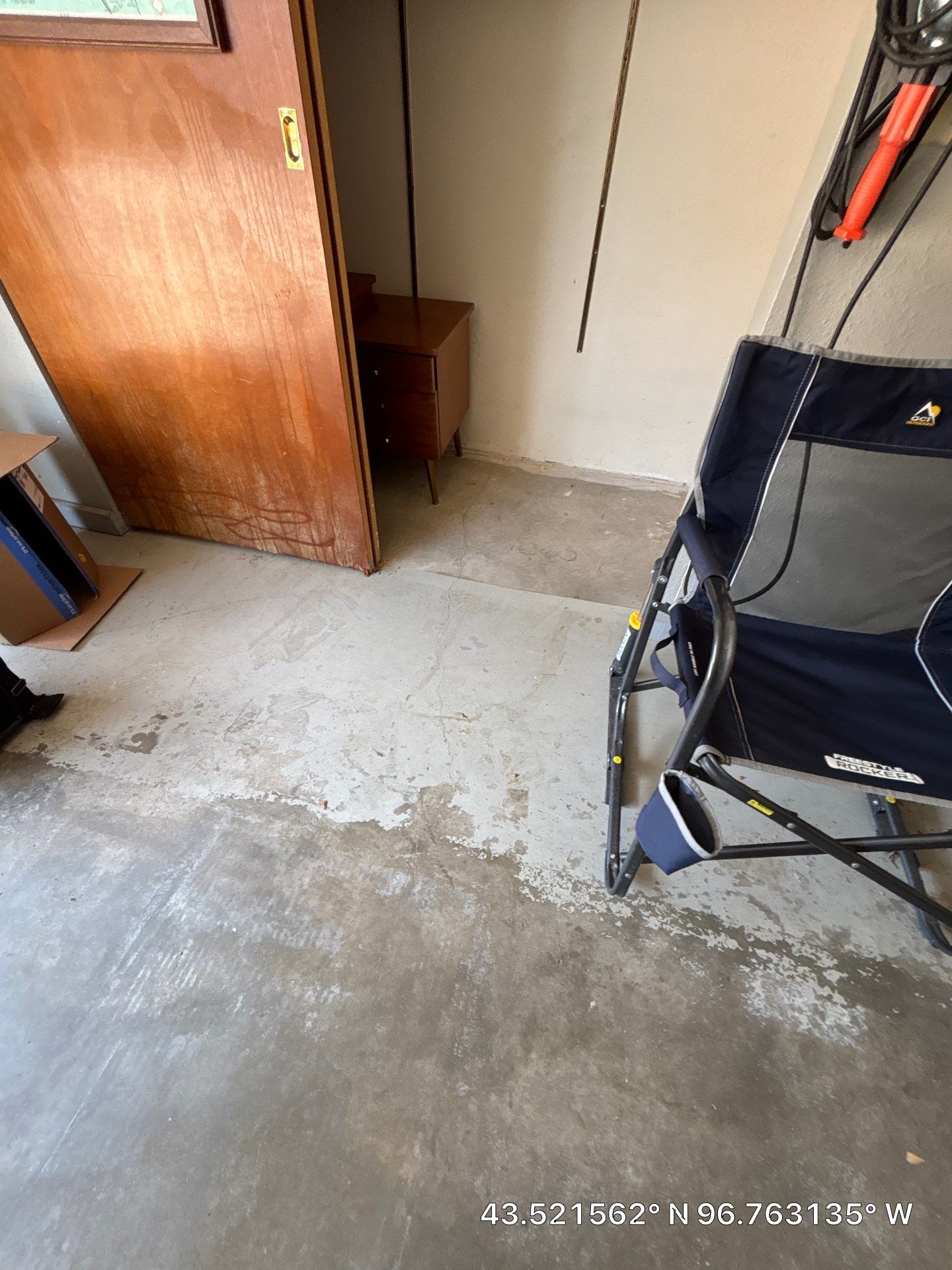 Domino Flake Garage Floor Coating Installation in Sioux Falls by Select Painting, Coatings & Garage Cabinets