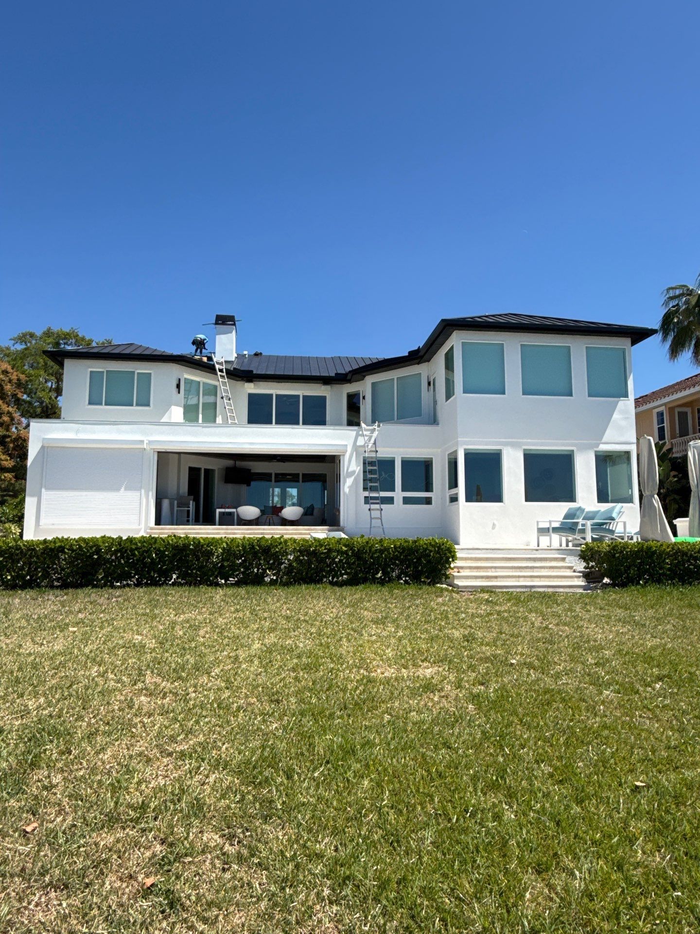 Soffit and Fascia Installation and black seamless gutters in Sarasota FL by Gutter Professors