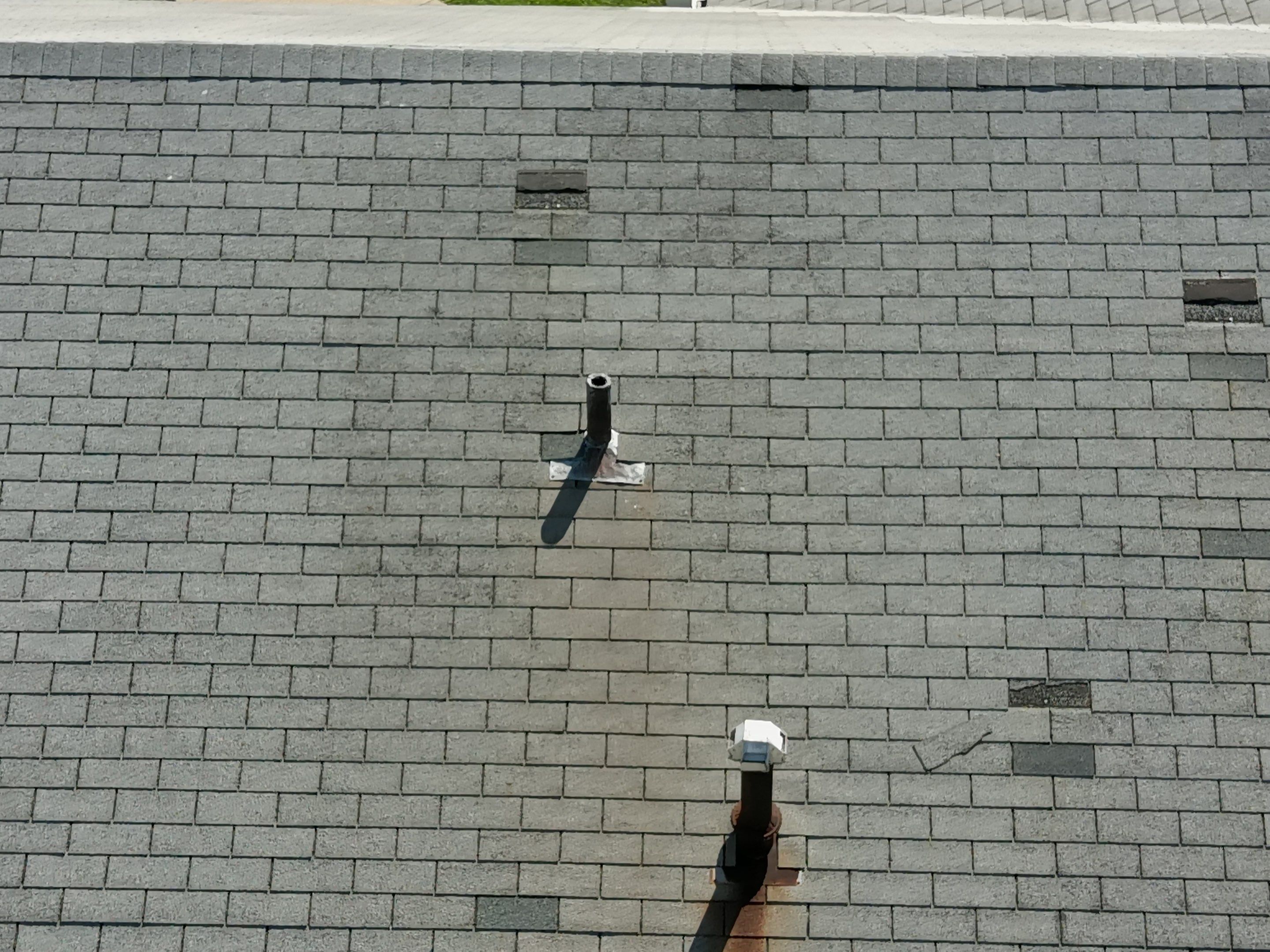 Commercial Roofing Installation using Performance Shingles by Mr. Roofer