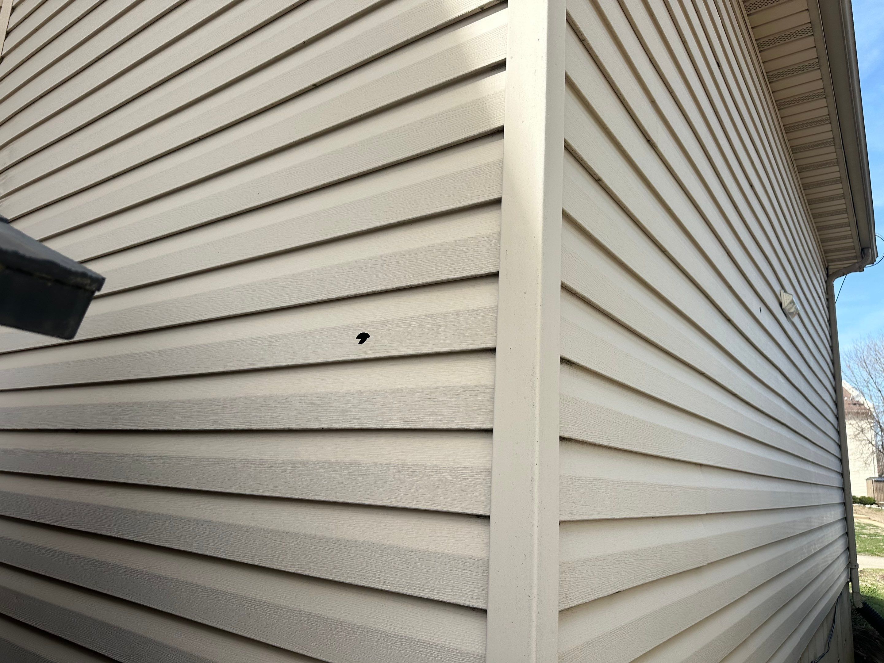 Mocha Lap Siding Installation for St. Louis Residential Exterior by Acute Roofing And Exteriors