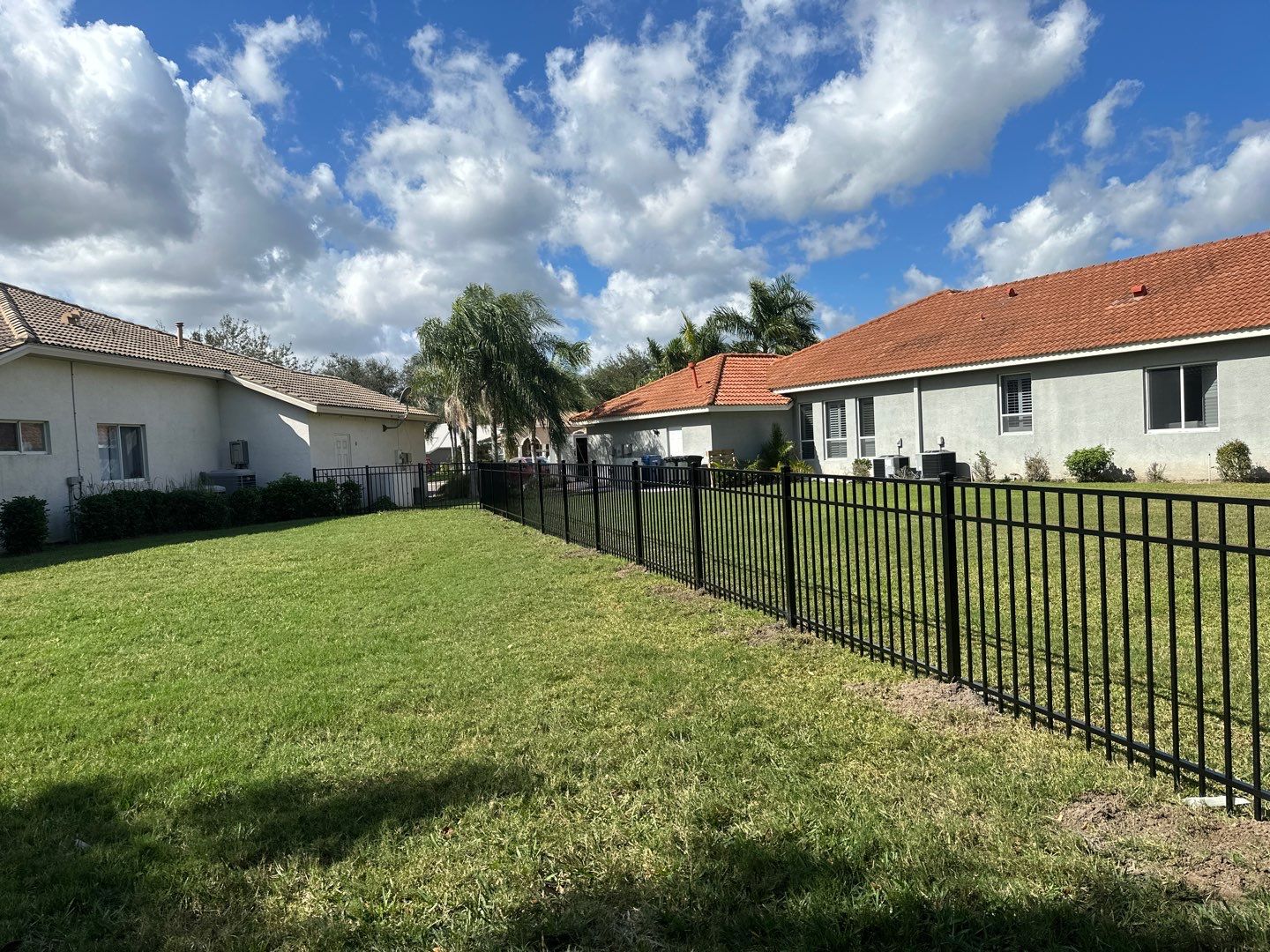 Aluminum Fence Installation using Black 3 Rail Aluminum Fence by Asap fence and gates, LLC