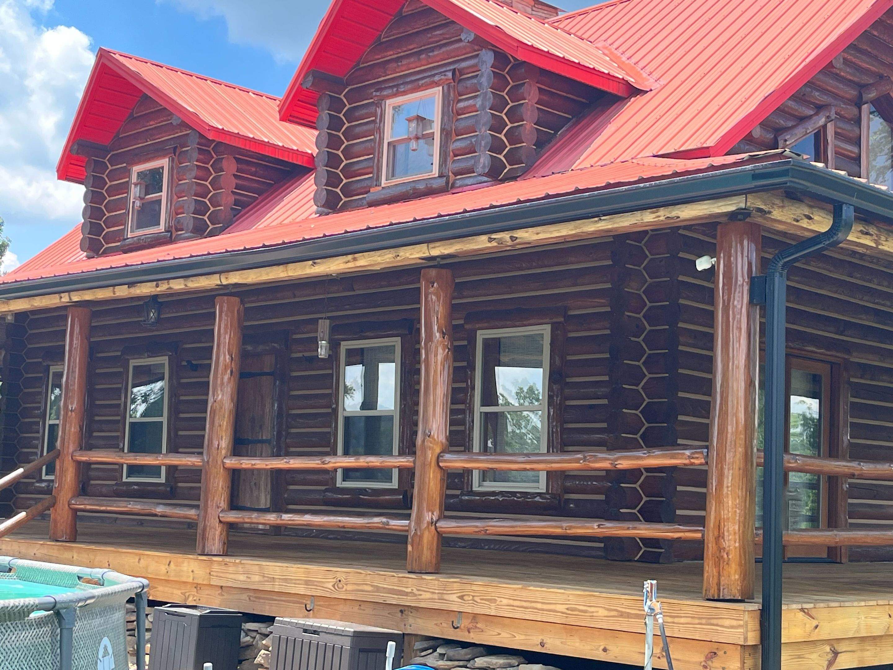 Mark and Cyndy H. by Log and Timber Worx