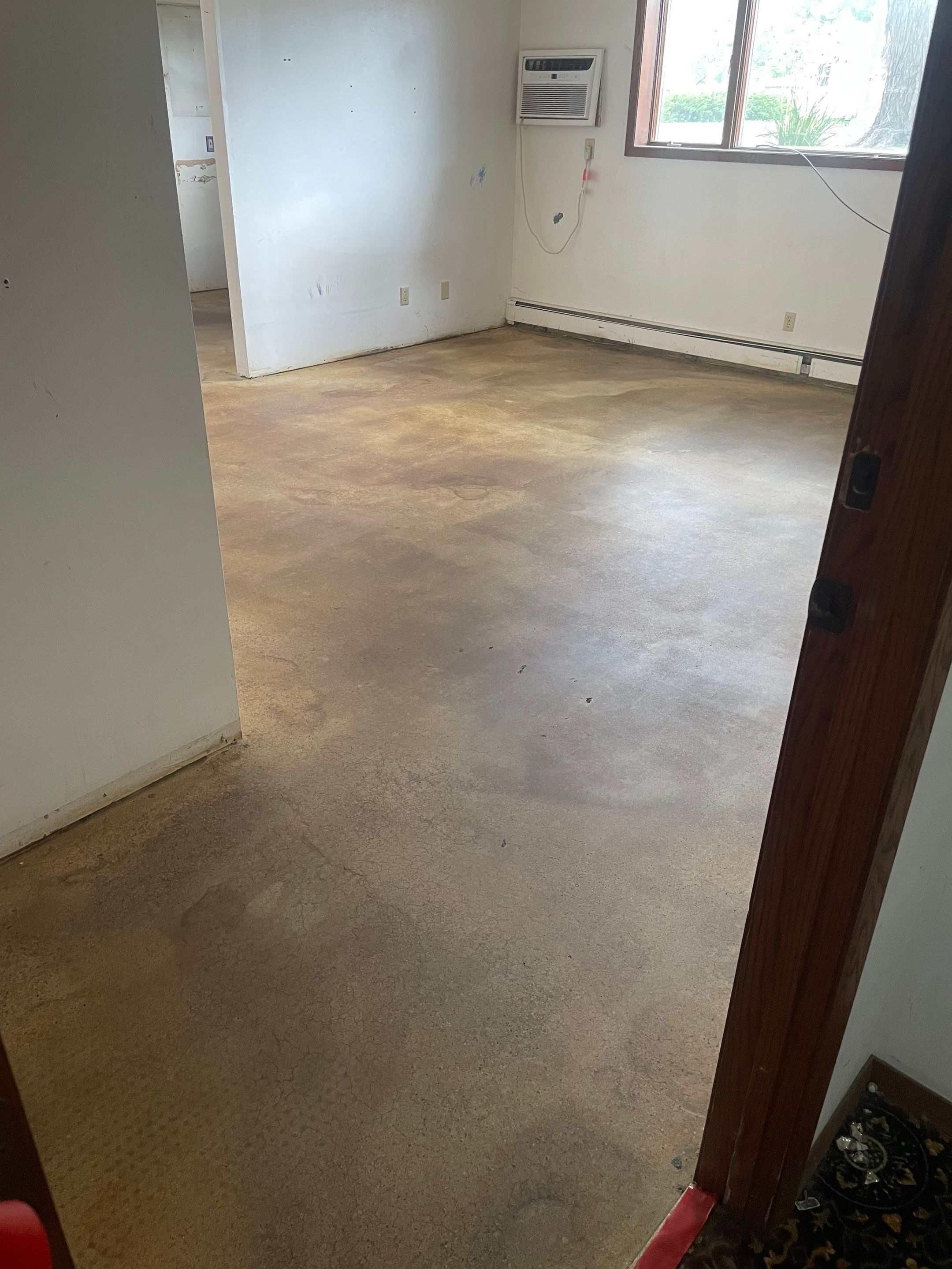 Commercial Subfloor Preparation and Flooring Restoration in Sioux Falls by Select Painting, Coatings & Garage Cabinets