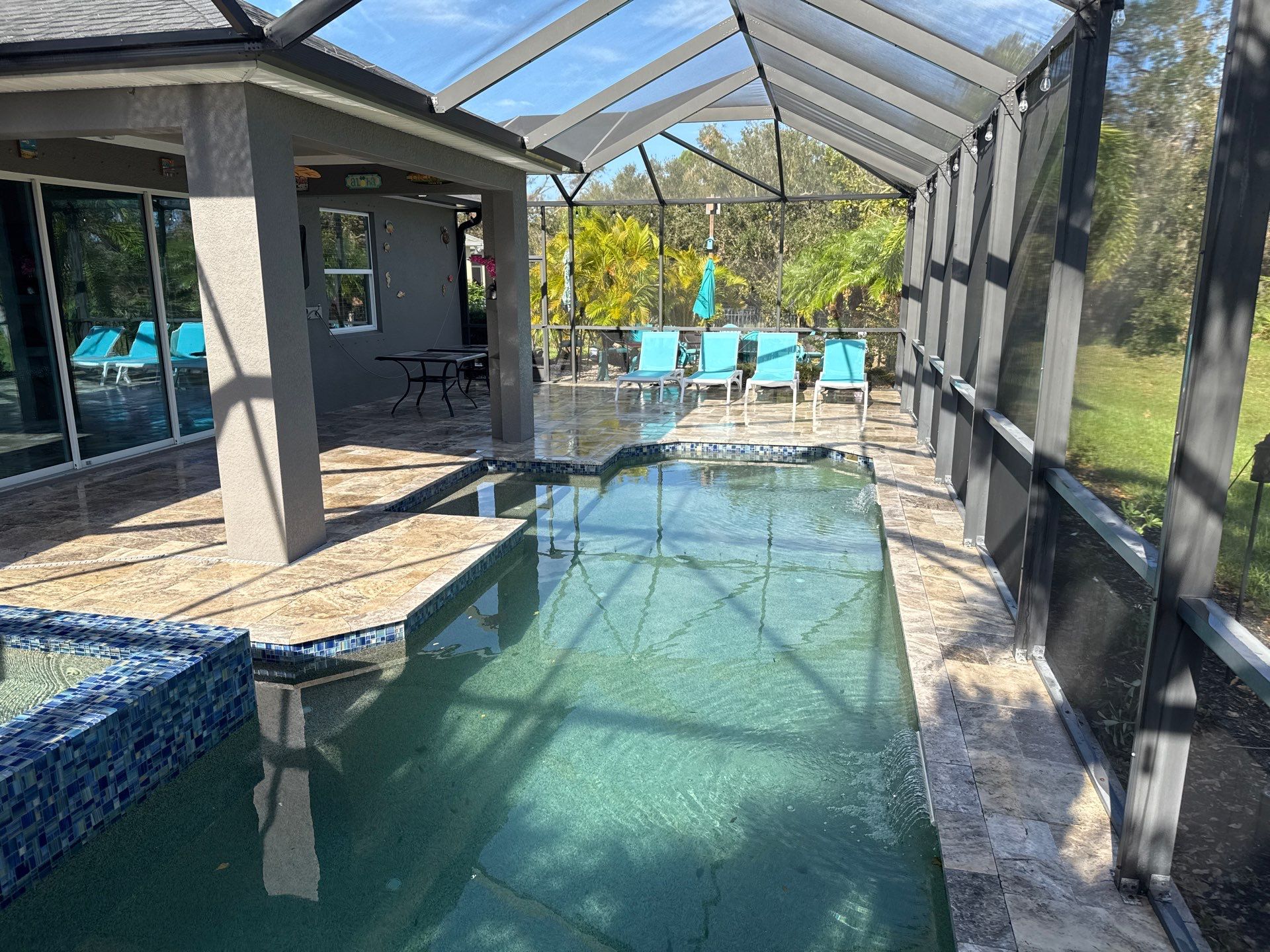 Travertine Pool Deck and Screen Enclosure Cleaning in Ellenton, FL | Oakleaf Hammock Community by Sunshine AquaWash