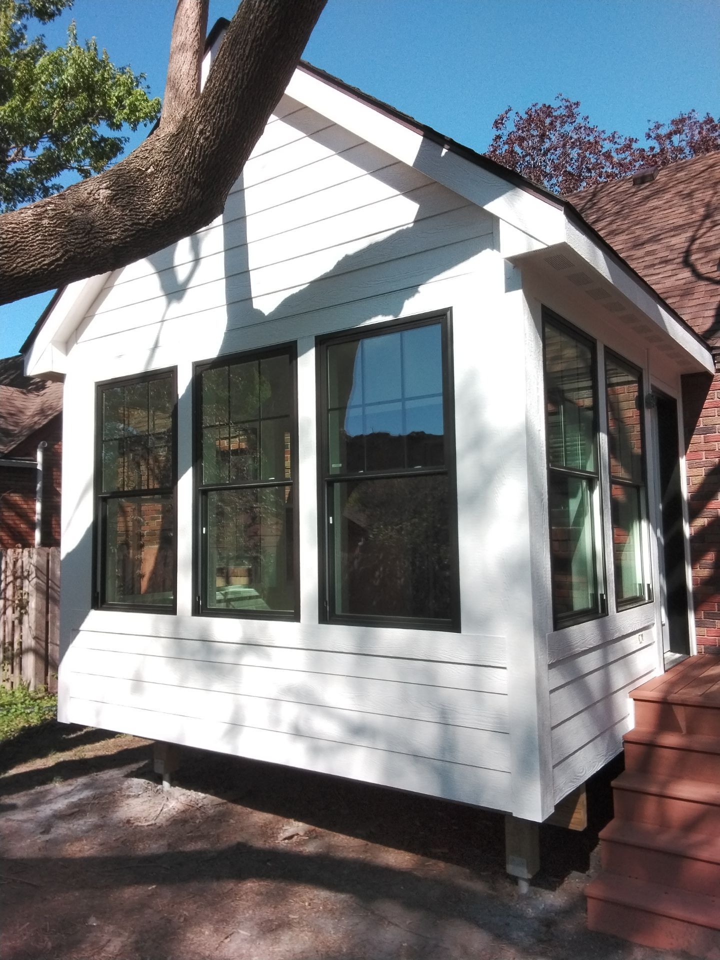 New 4 season room interior & exterior painting by Midwest Paint LLC