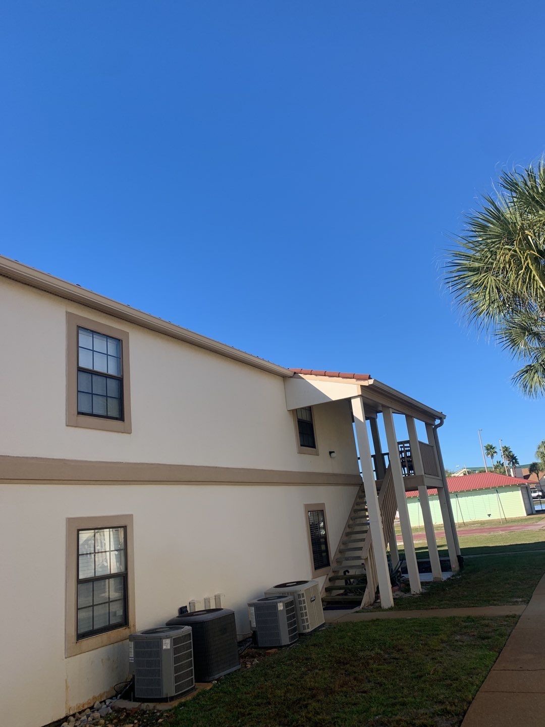 SandTone Seamless Gutter Installation in Panama City Beach FL by Gutter Professors