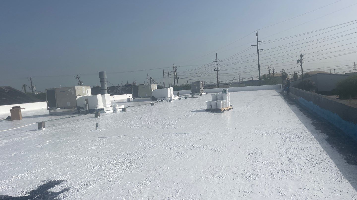 Dirty leaking Gravel Roof by Bayfront Roofing and Construction