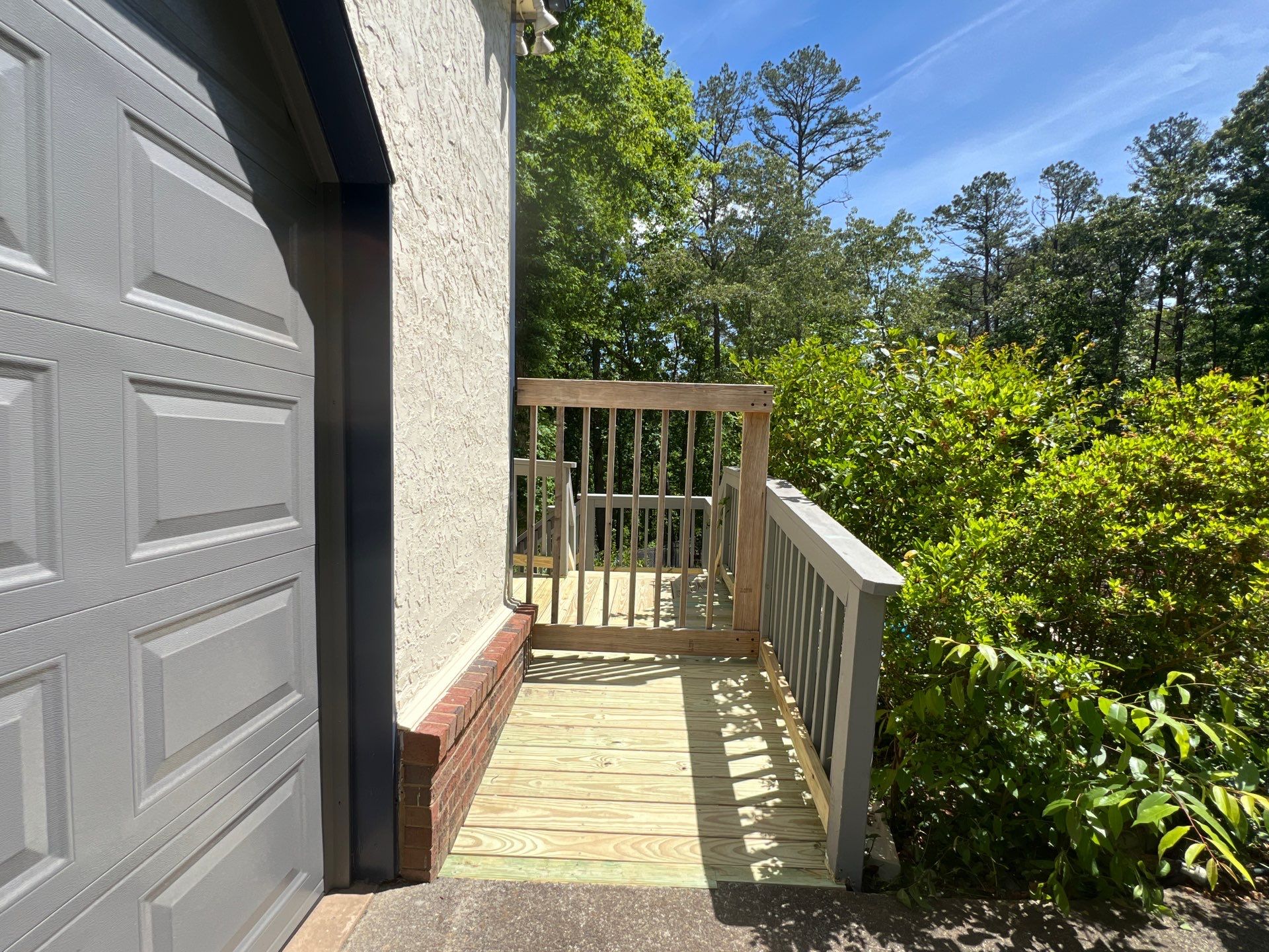 Pressure-Treated Wood Deck Resurfacing and Staircase Reconstruction in Canton by Swift Home Renovations