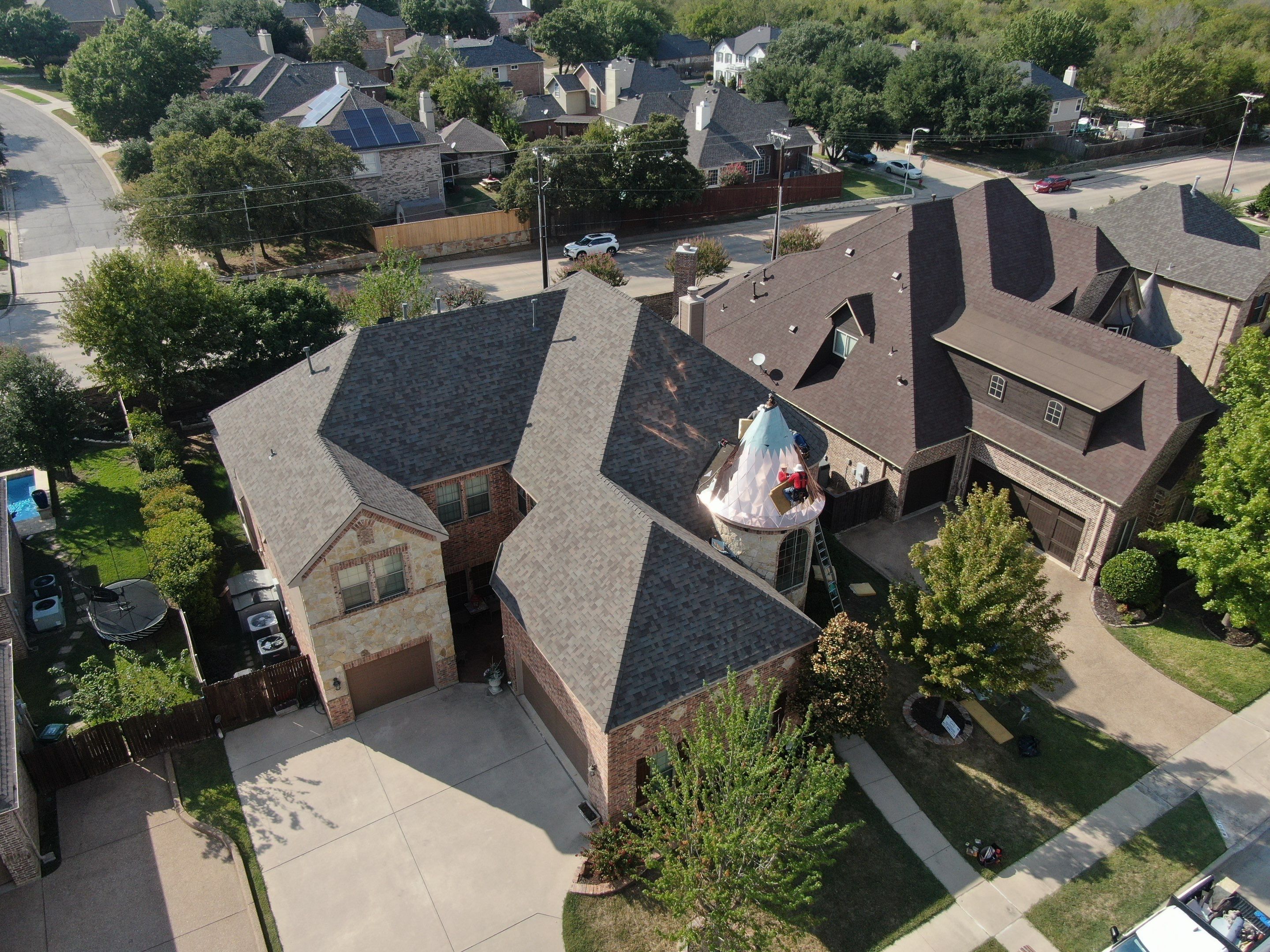 Installing Custom copper turret and Malarkey Vista Class 4 shingles Hail Damage Upgrade by Becker Roofing and Exteriors
