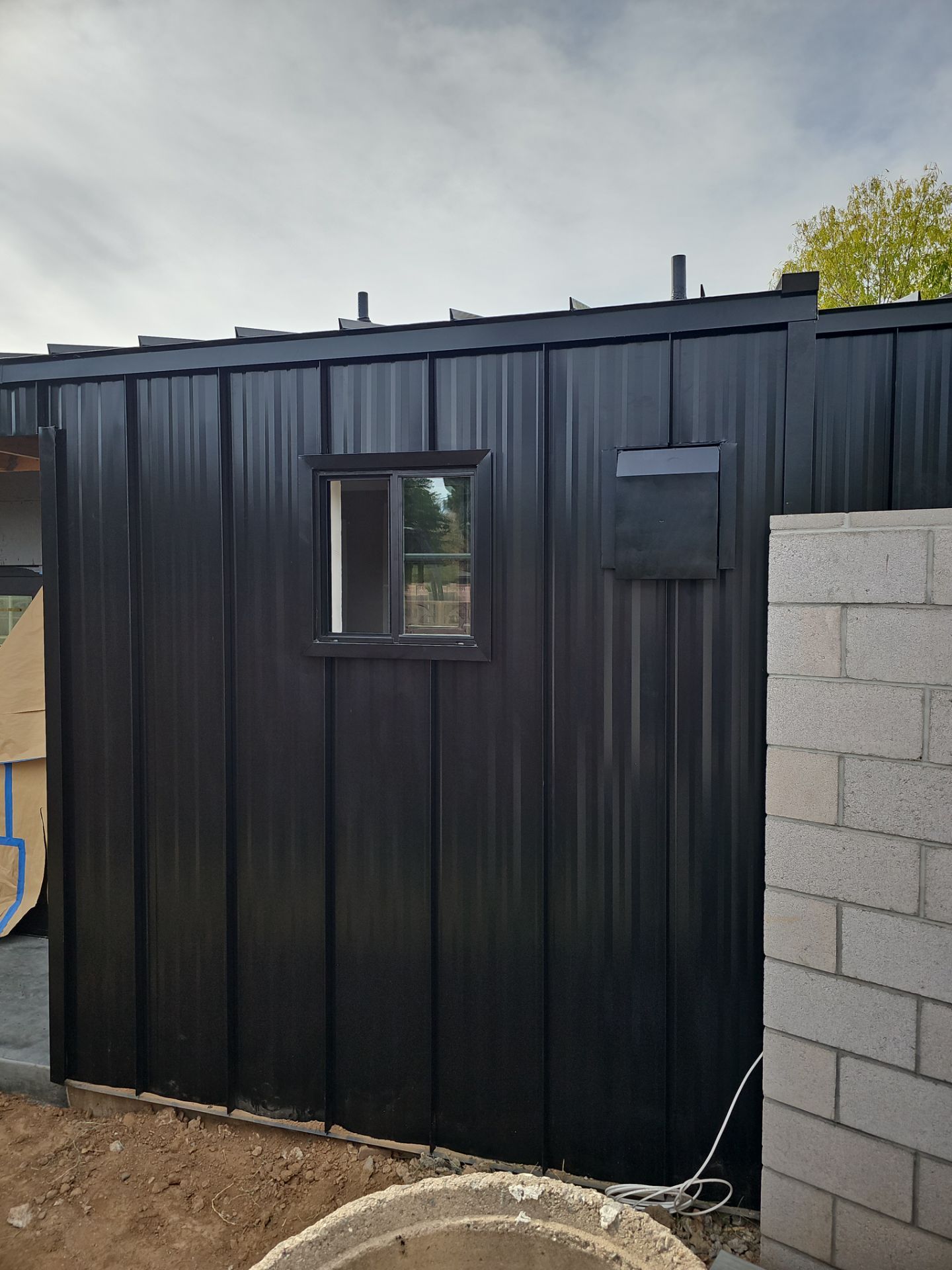 Black Standing Seam by Reimagine Roofing