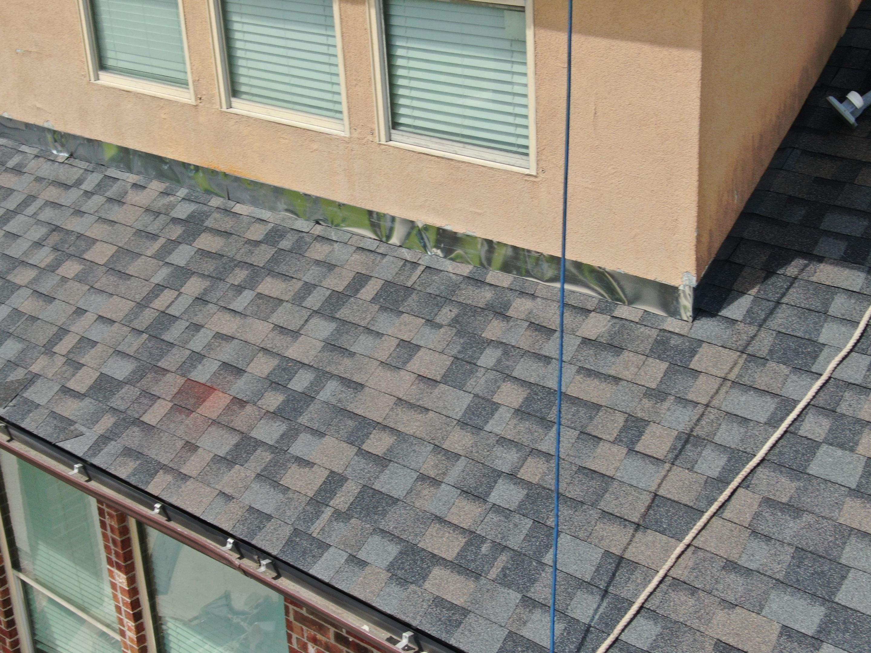 Flashing Stucco above the Roof by Bayfront Roofing and Construction