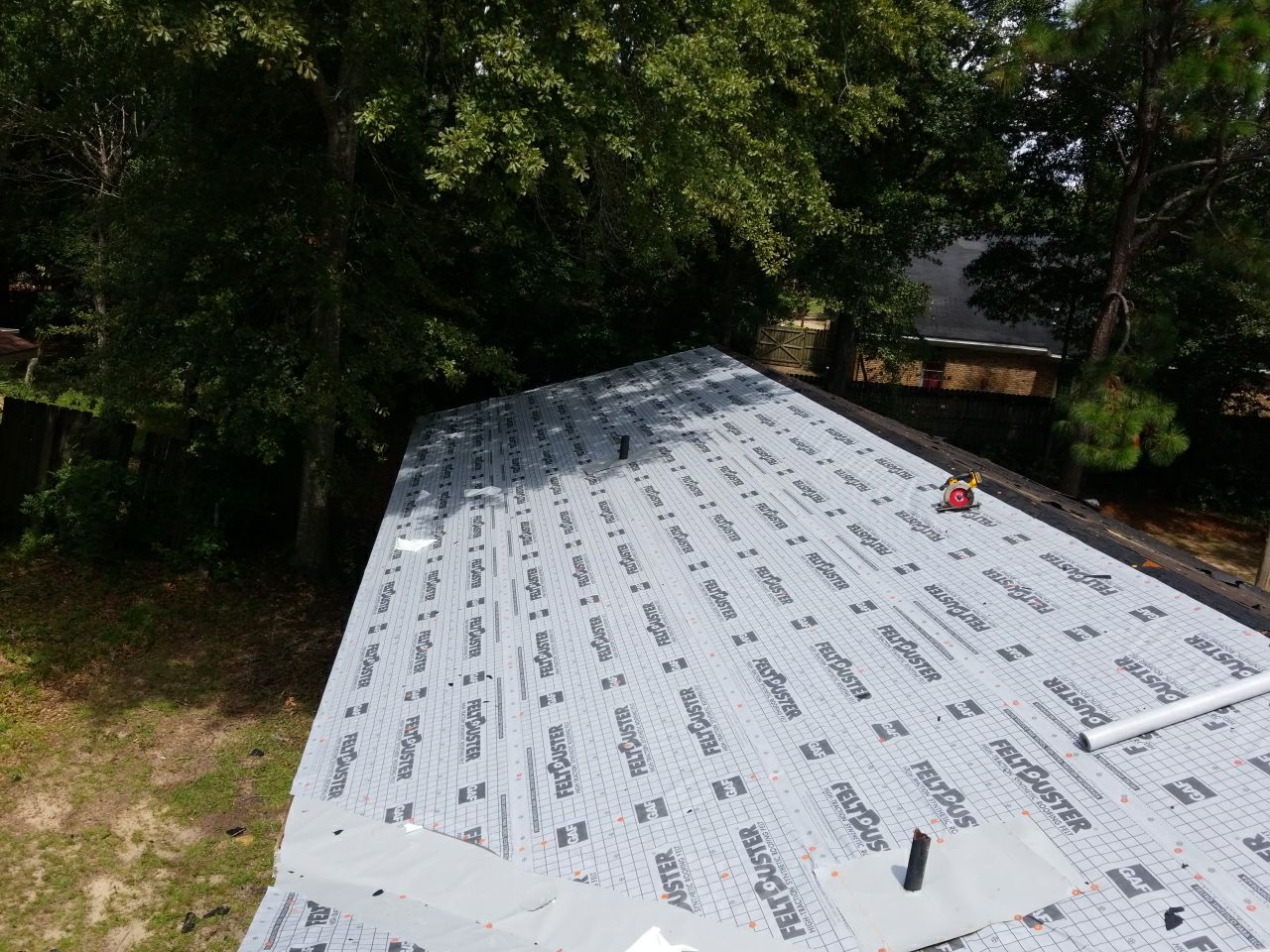 Residential Roofing Installation using Roof Replacement by American Roofing & Construction LLC