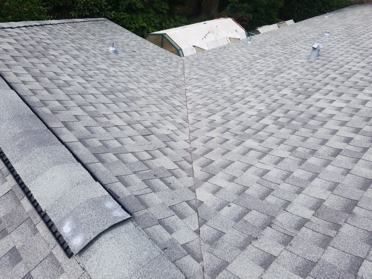 Residential Roofing Installation using Roof Replacement by American Roofing & Construction LLC