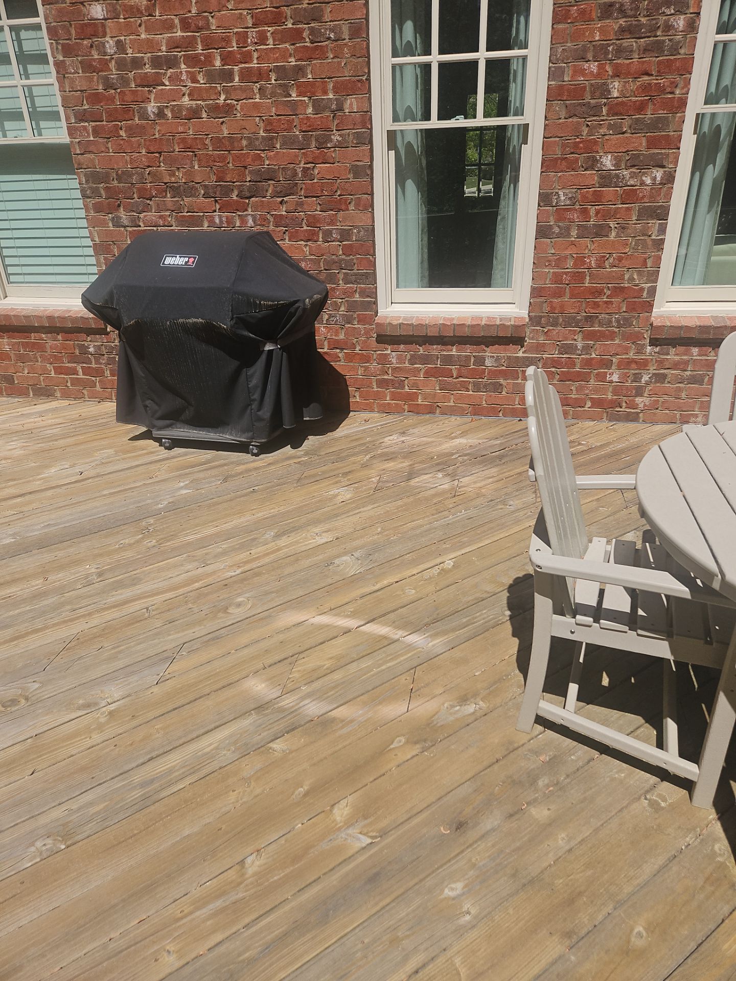Deck Resurface using Deckorators Summit Series and Deckorators ALX Contemporary railing by Nelson Exteriors 
