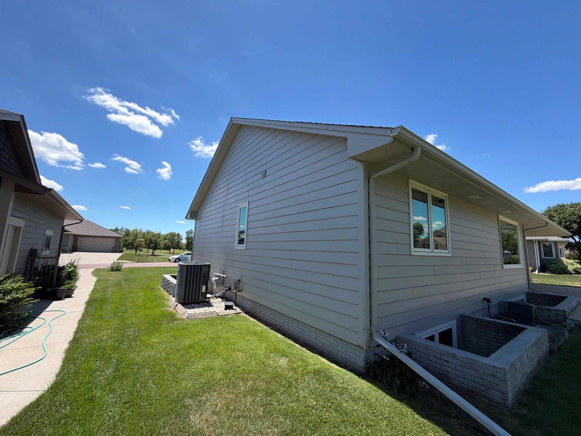 Full Exterior Painting and Siding Refresh in Hartford by Select Painting, Coatings & Garage Cabinets